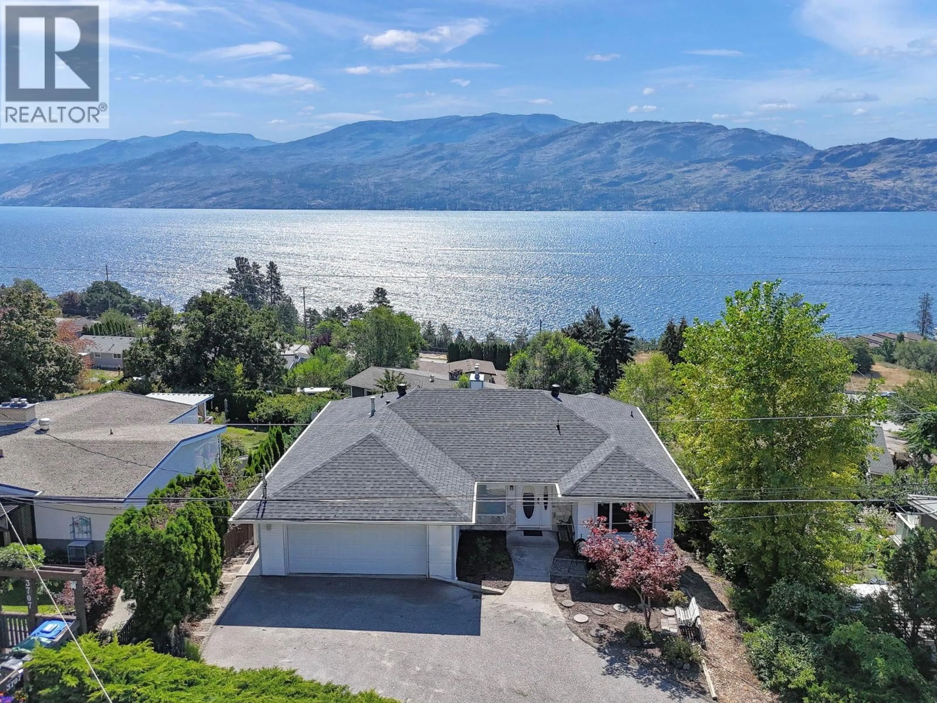 A pic from outside/outdoor area/front of a property/back of a property/a pic from drone, water/lake/river/ocean view for 3715 LORNELL CRESCENT, Peachland British Columbia V0H1X2