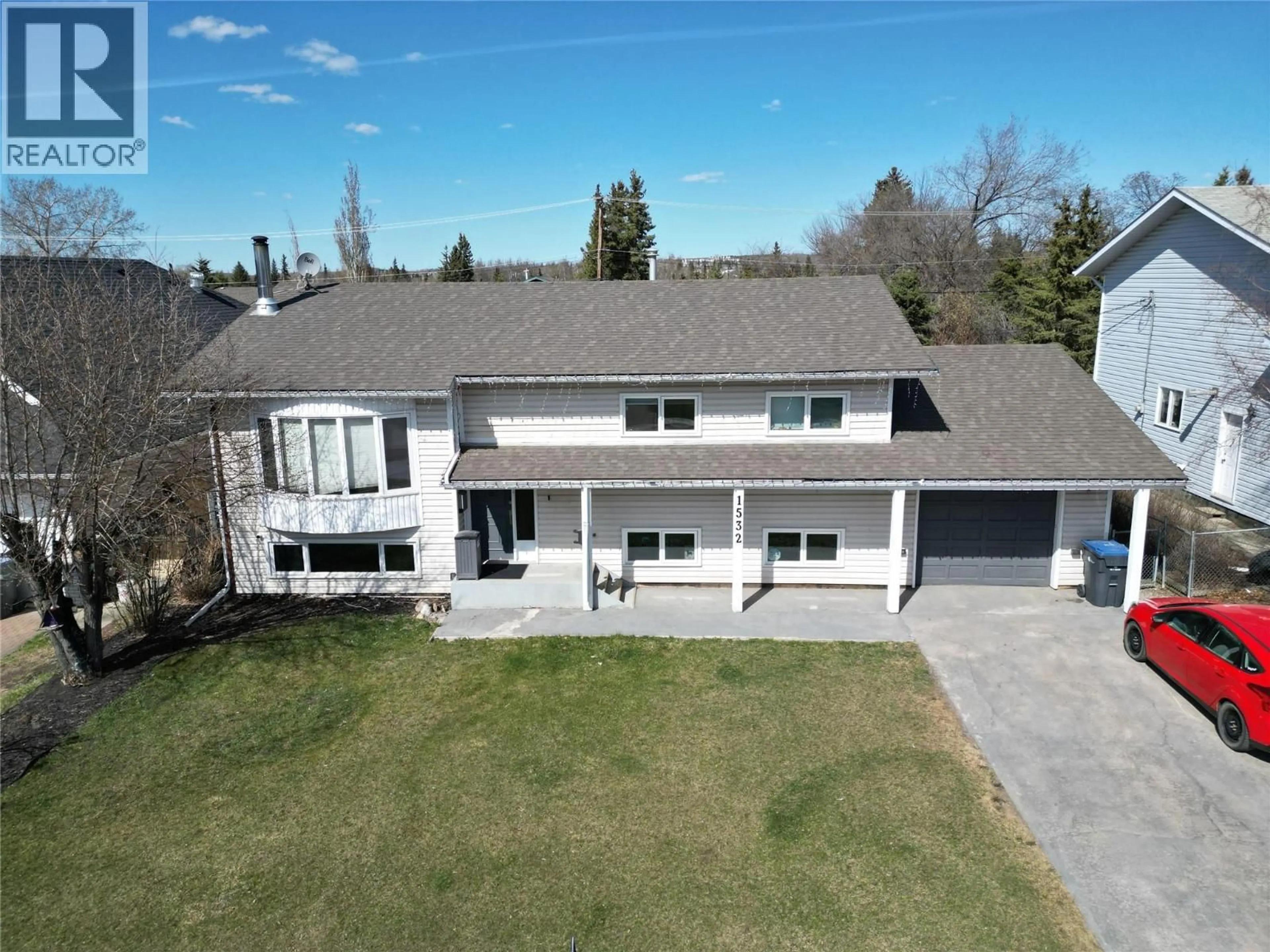 A pic from outside/outdoor area/front of a property/back of a property/a pic from drone, unknown for 1532 109 AVENUE, Dawson Creek British Columbia V1G2V2