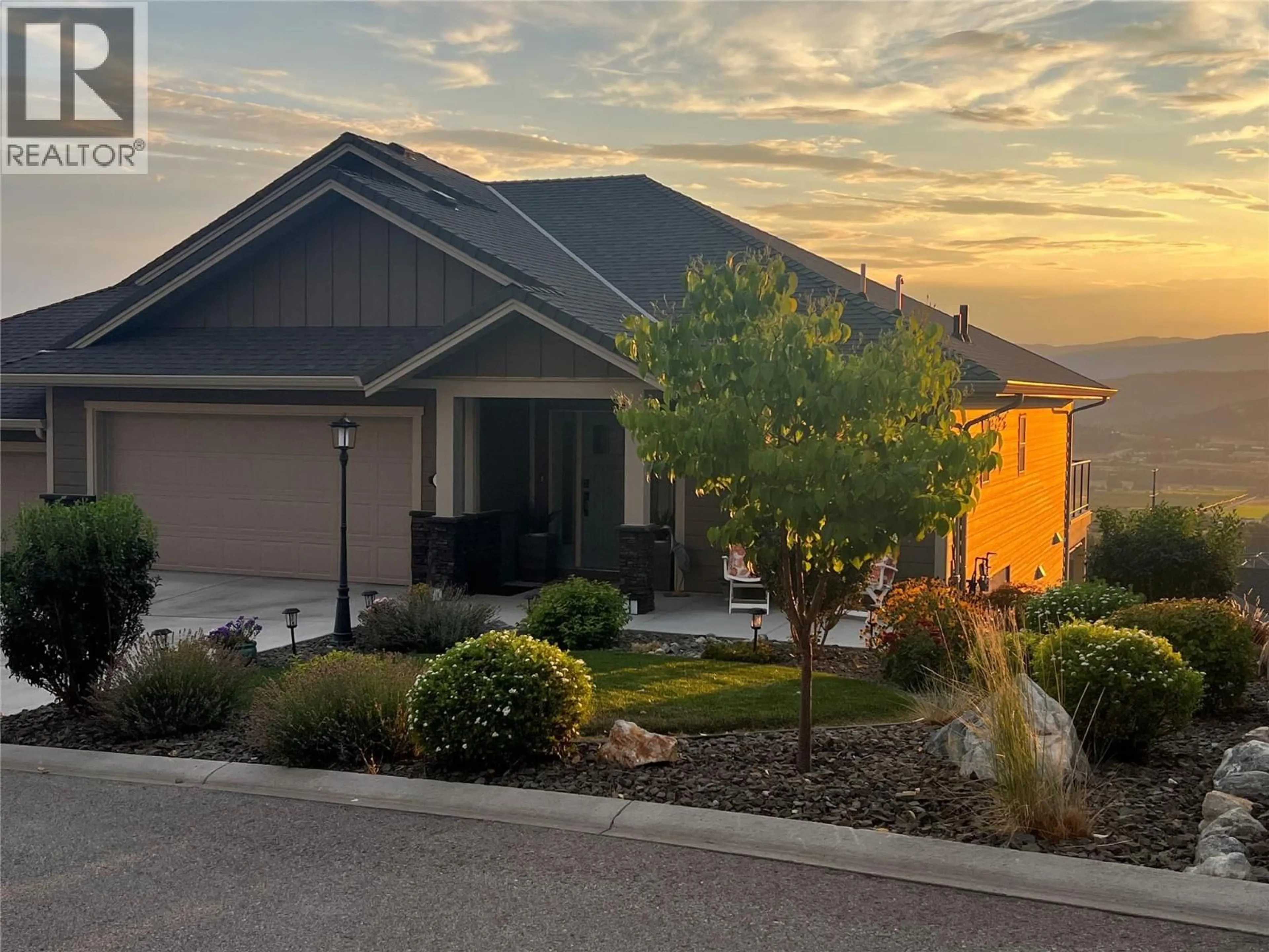 Home with vinyl exterior material, street for 3938 CIMARRON DRIVE, Kelowna British Columbia V1X8E4