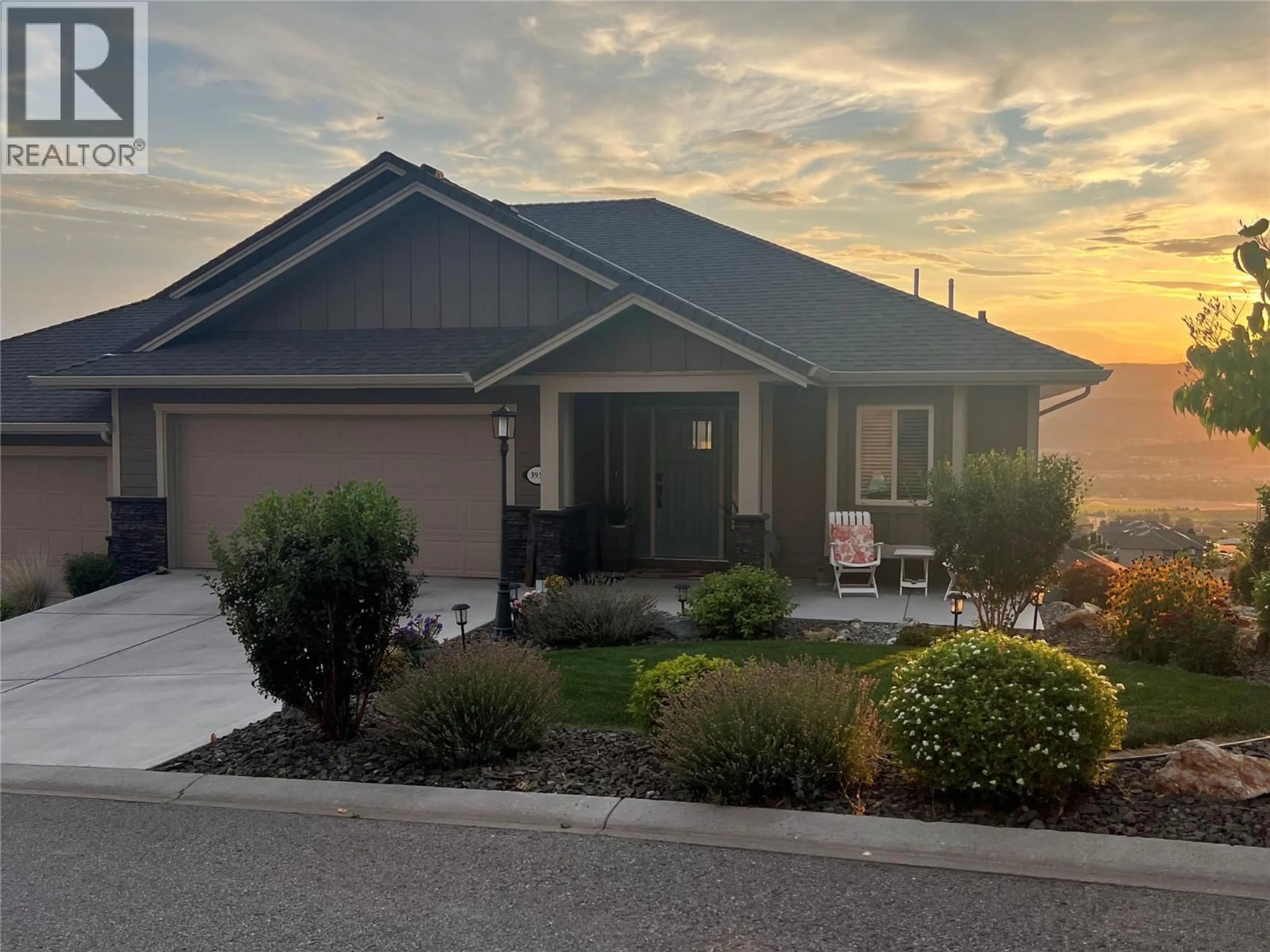 Home with vinyl exterior material, street for 3938 CIMARRON DRIVE, Kelowna British Columbia V1X8E4