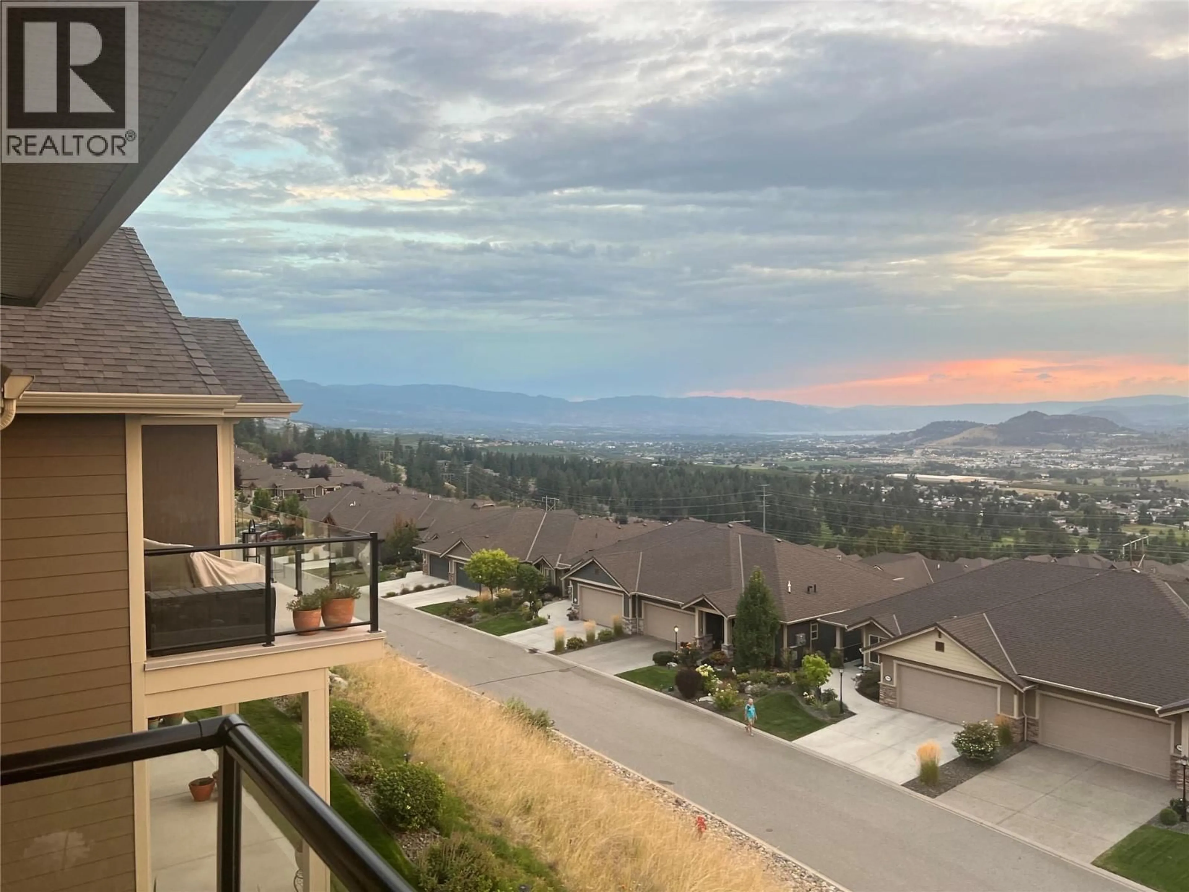 A pic from outside/outdoor area/front of a property/back of a property/a pic from drone, mountain view for 3938 CIMARRON DRIVE, Kelowna British Columbia V1X8E4