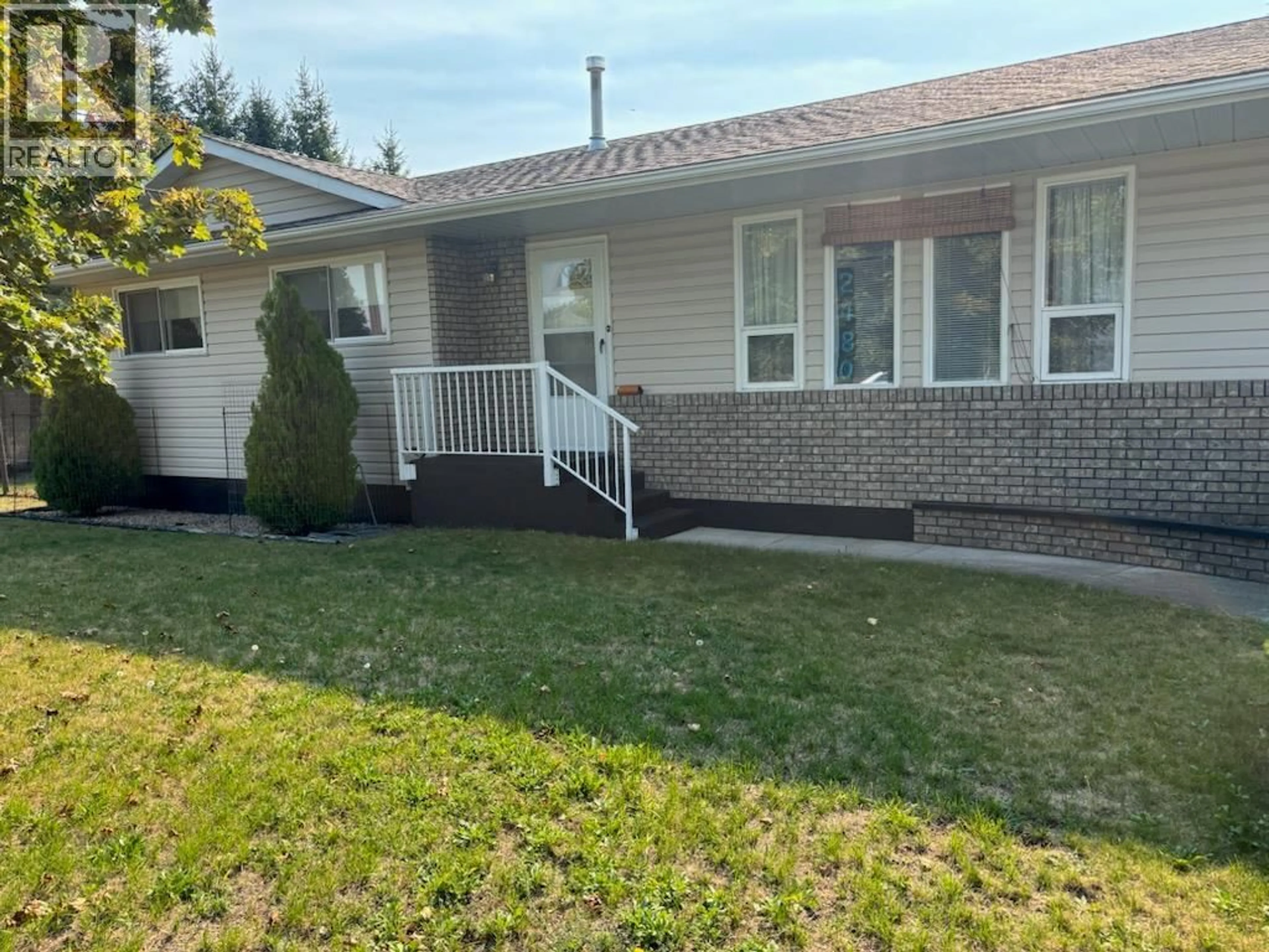 Home with vinyl exterior material, street for 2480 75TH AVENUE, Grand Forks British Columbia V0H1H2