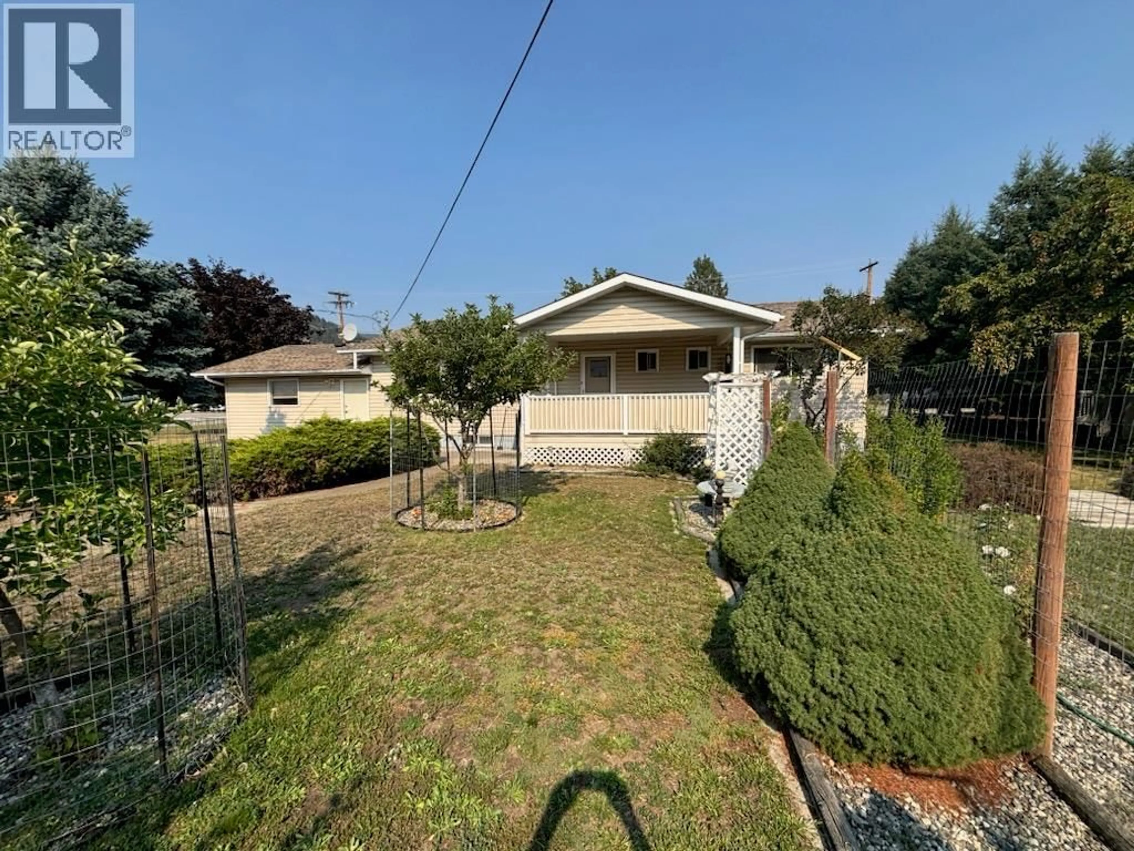 A pic from outside/outdoor area/front of a property/back of a property/a pic from drone, street for 2480 75TH AVENUE, Grand Forks British Columbia V0H1H2