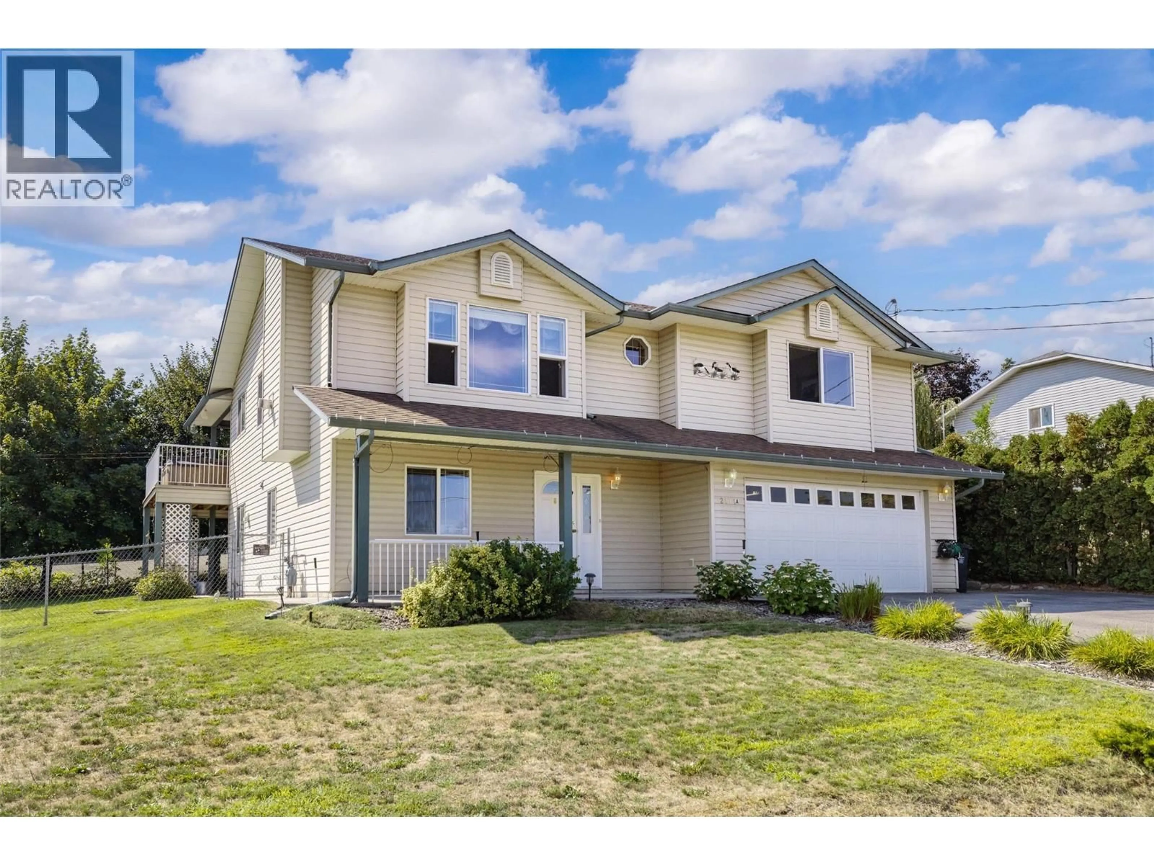 Home with vinyl exterior material, street for 2171 AMUNDSEN ROAD, Lake Country British Columbia V4V1J1