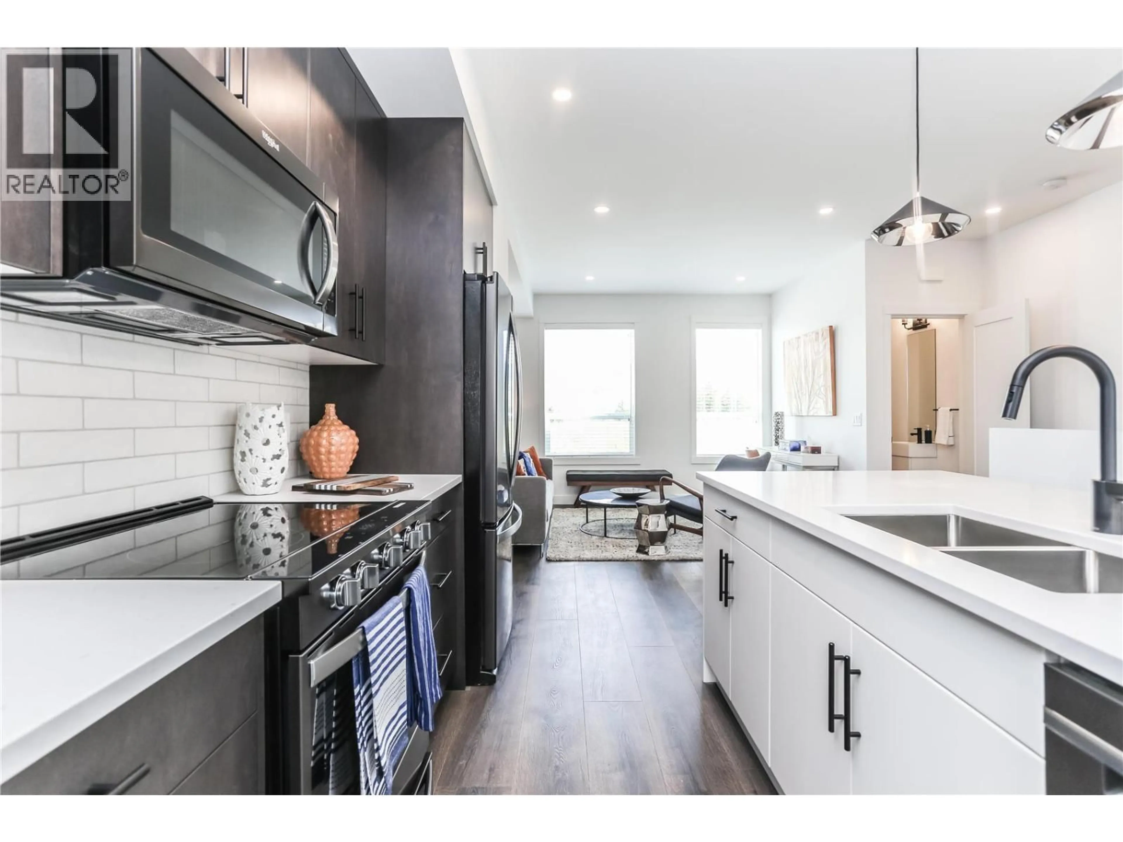 Open concept kitchen, ceramic/tile floor for 26 - 610 ACADEMY WAY, Kelowna British Columbia V1V0E8