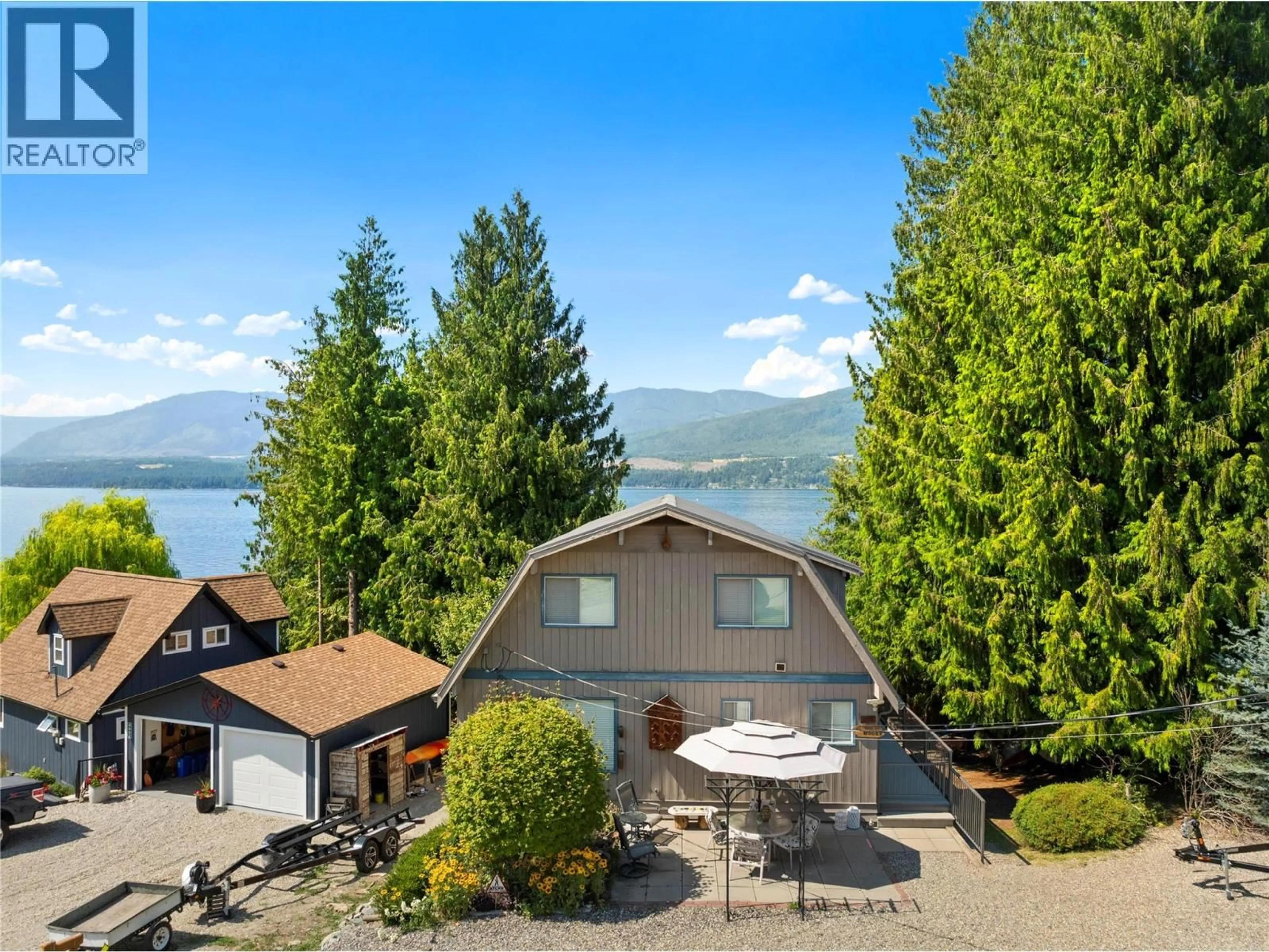 A pic from outside/outdoor area/front of a property/back of a property/a pic from drone, water/lake/river/ocean view for 4086 TORRY ROAD, Eagle Bay British Columbia V0E1T0