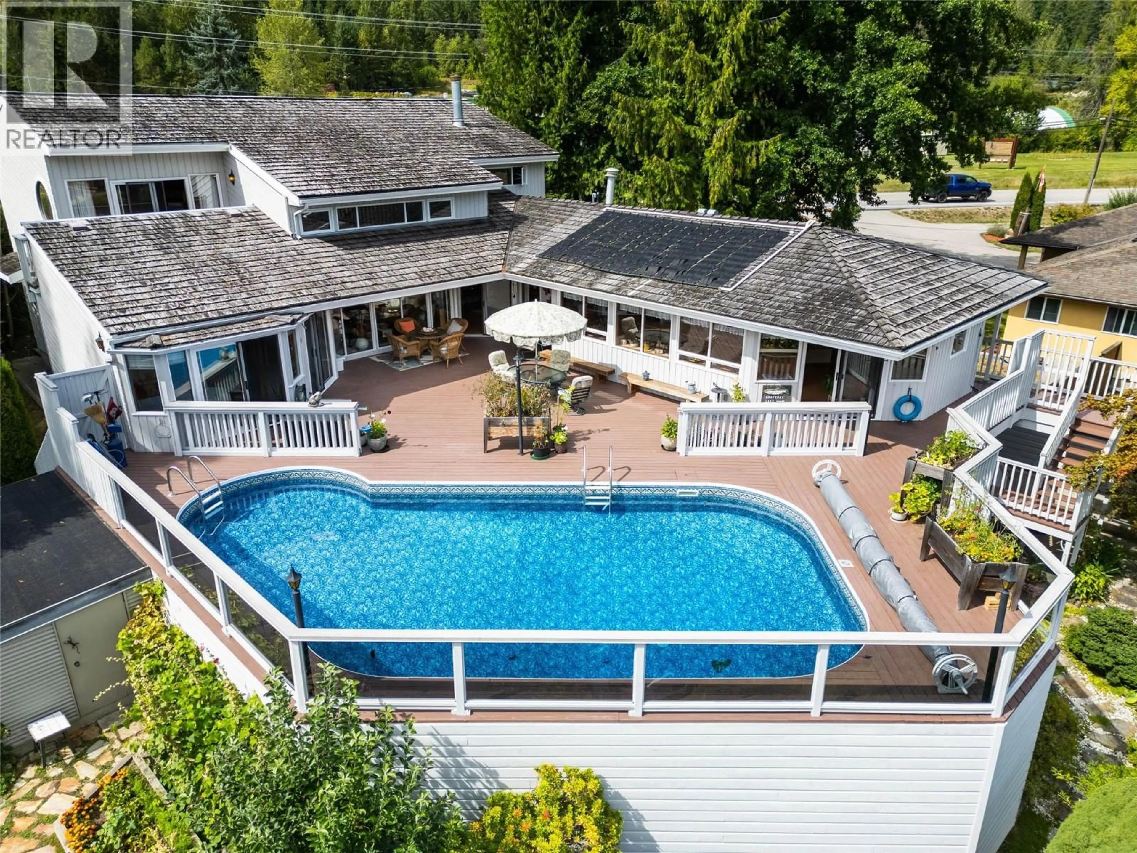 A pic from outside/outdoor area/front of a property/back of a property/a pic from drone, water/lake/river/ocean view for 1896 3A HIGHWAY, Nelson British Columbia V1L6K1