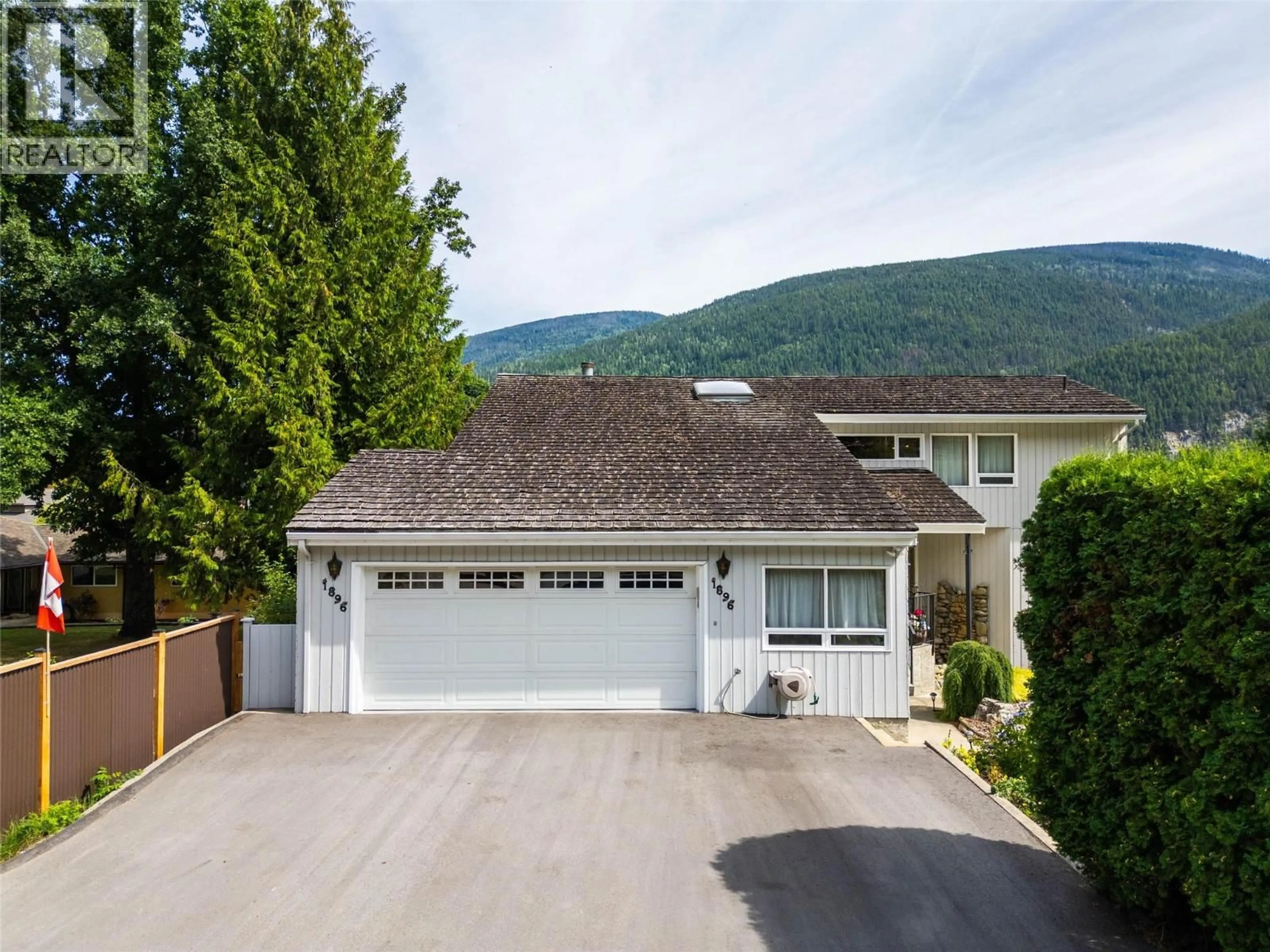 A pic from outside/outdoor area/front of a property/back of a property/a pic from drone, mountain view for 1896 3A HIGHWAY, Nelson British Columbia V1L6K1