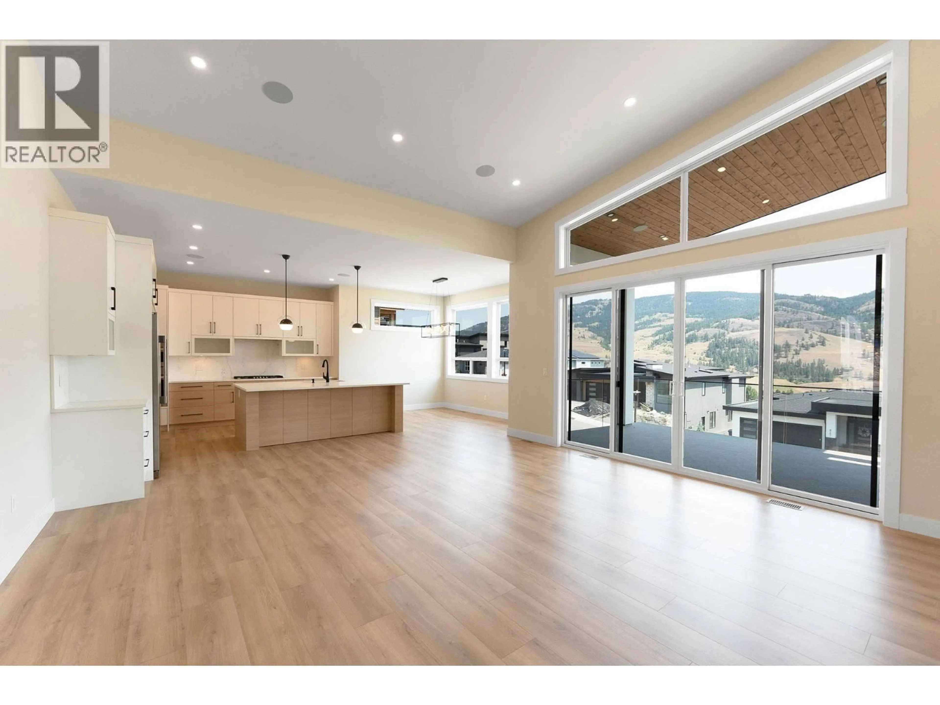 Open concept kitchen, wood/laminate floor for 845 MELROSE STREET, Kelowna British Columbia V1P0A8