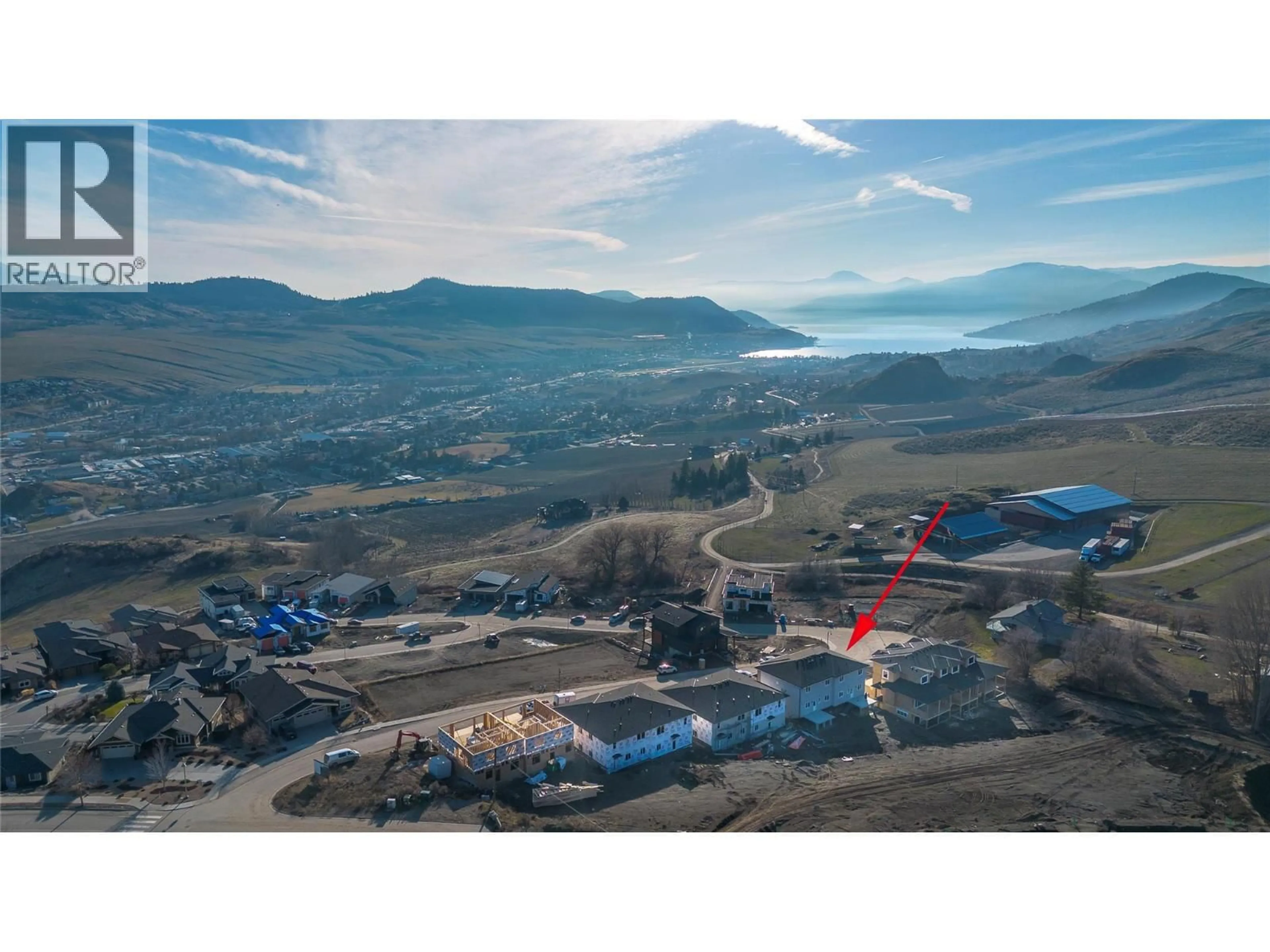 A pic from outside/outdoor area/front of a property/back of a property/a pic from drone, mountain view for 4315 PAINTED TURTLE DRIVE, Vernon British Columbia V1H1A2