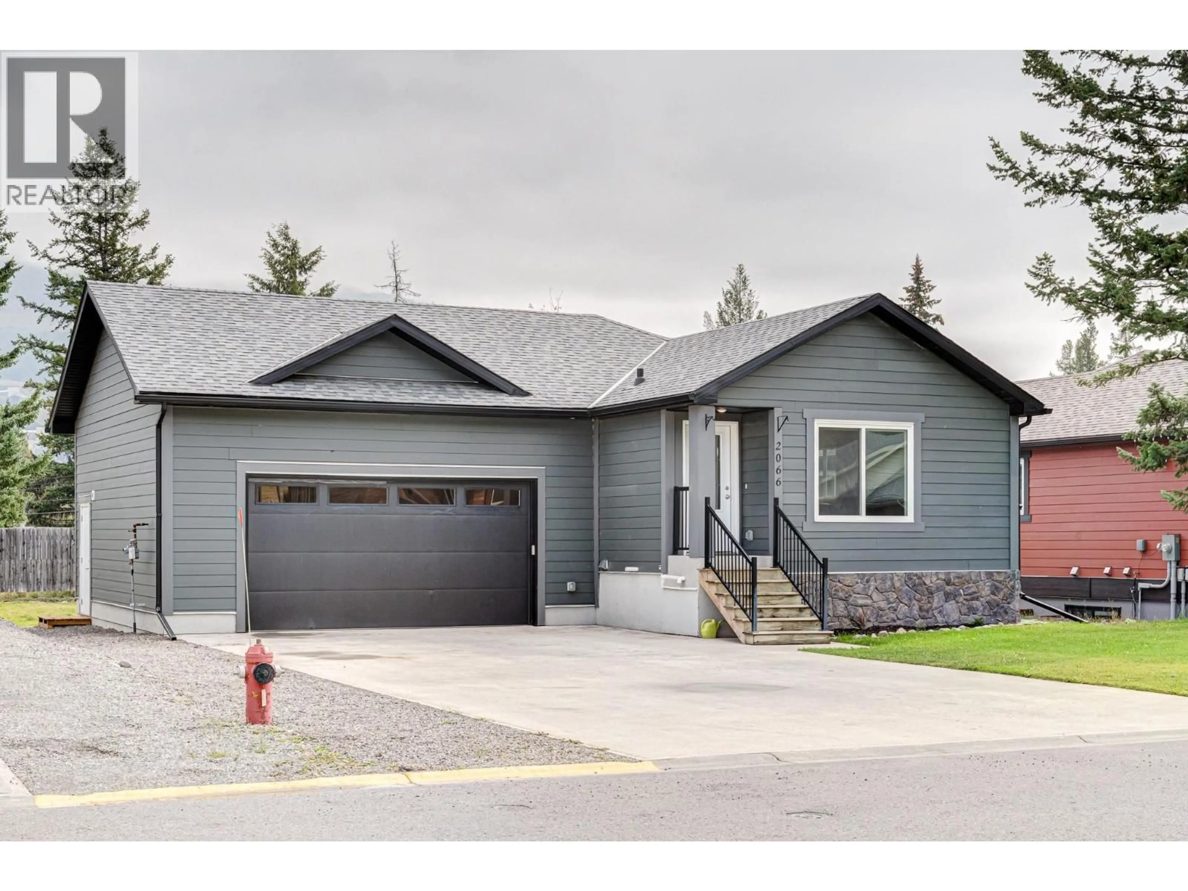Home with vinyl exterior material, street for 2066 GOLDEN EAGLE DRIVE, Sparwood British Columbia V0B2G2