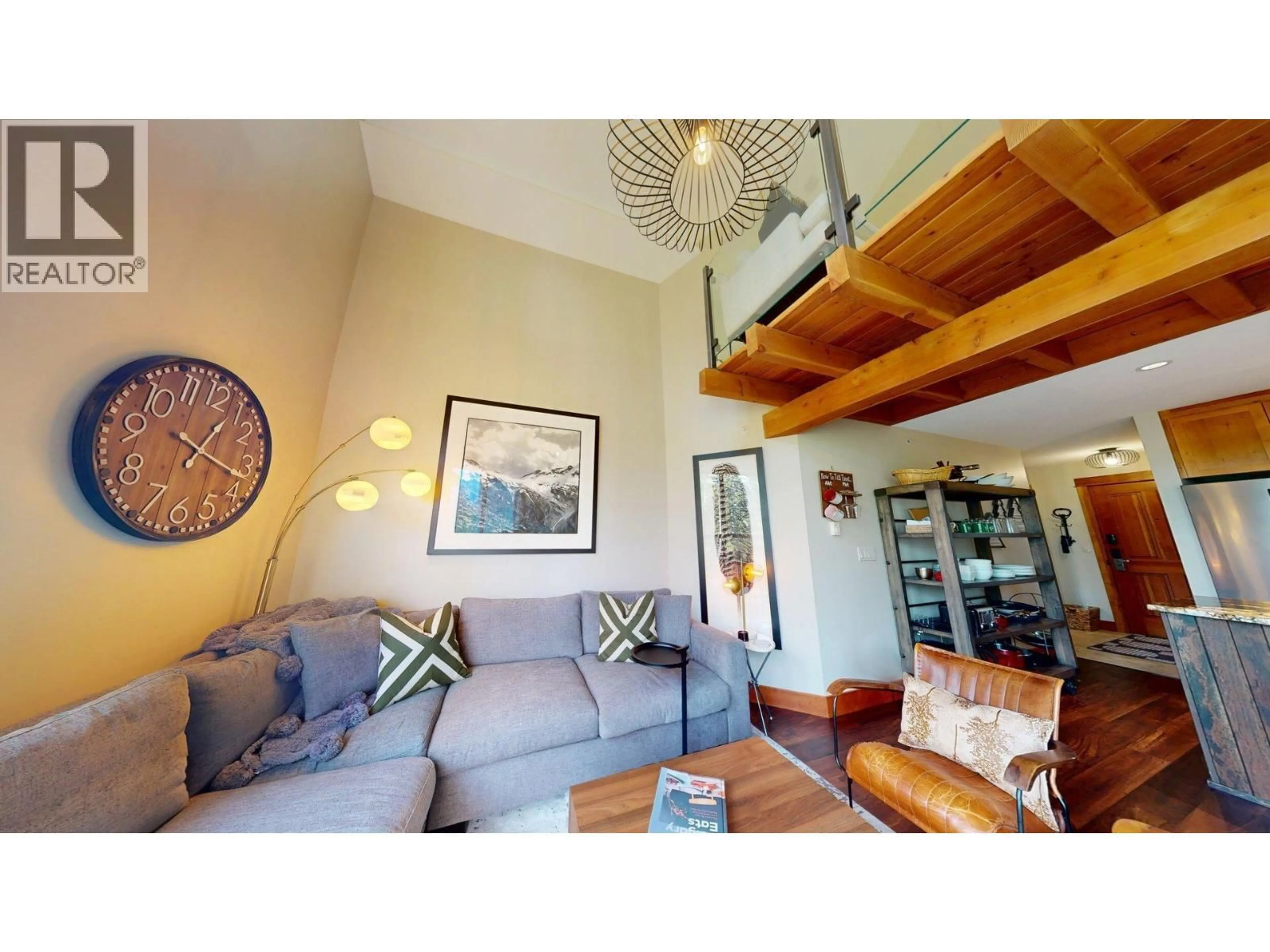 Living room with furniture, wood/laminate floor for 644 - 4559 TIMBERLINE CRESCENT, Fernie British Columbia V0B1M6