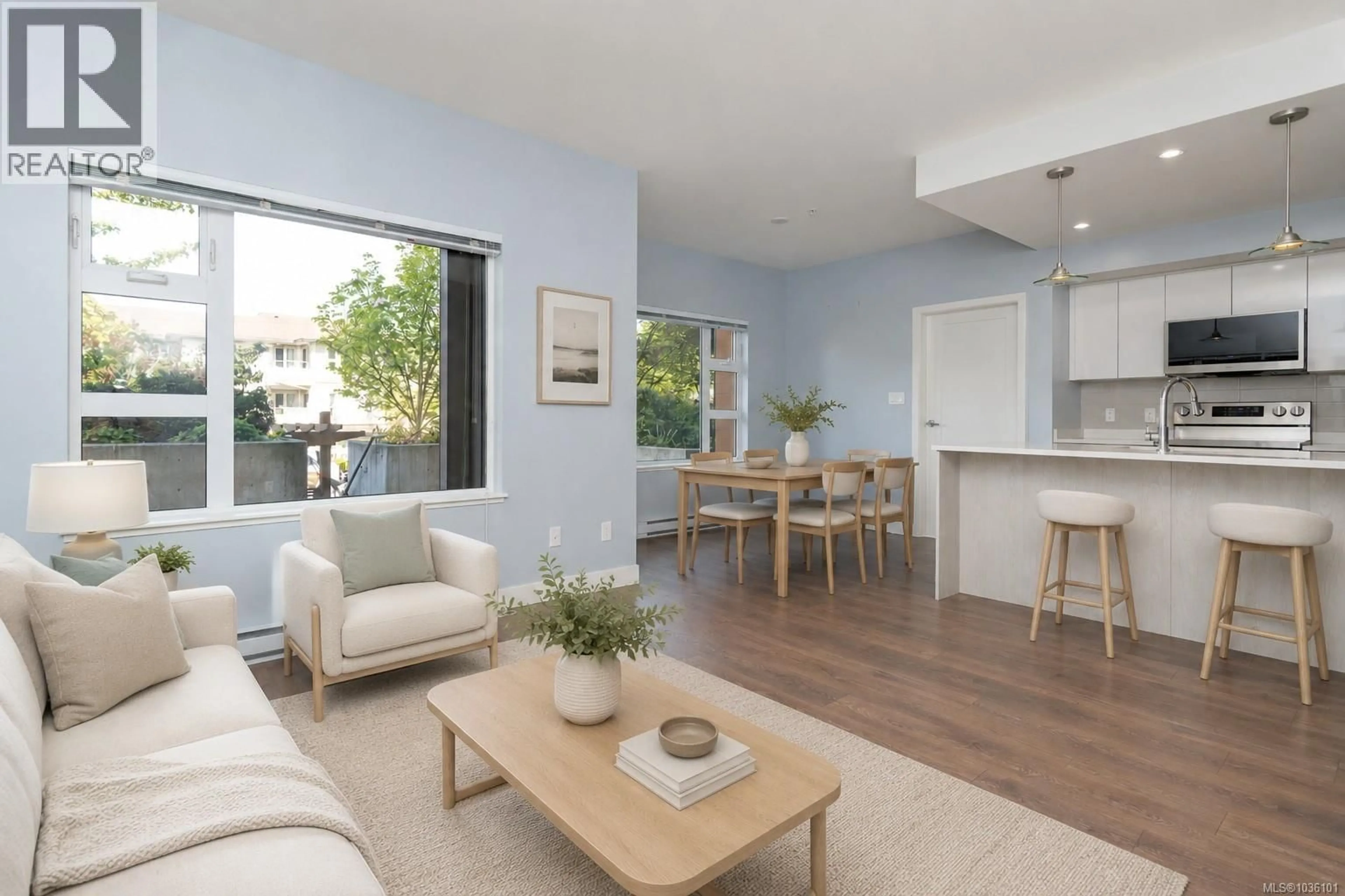 Living room with furniture, unknown for 102 - 3333 GLASGOW AVENUE, Saanich British Columbia V8X1M5