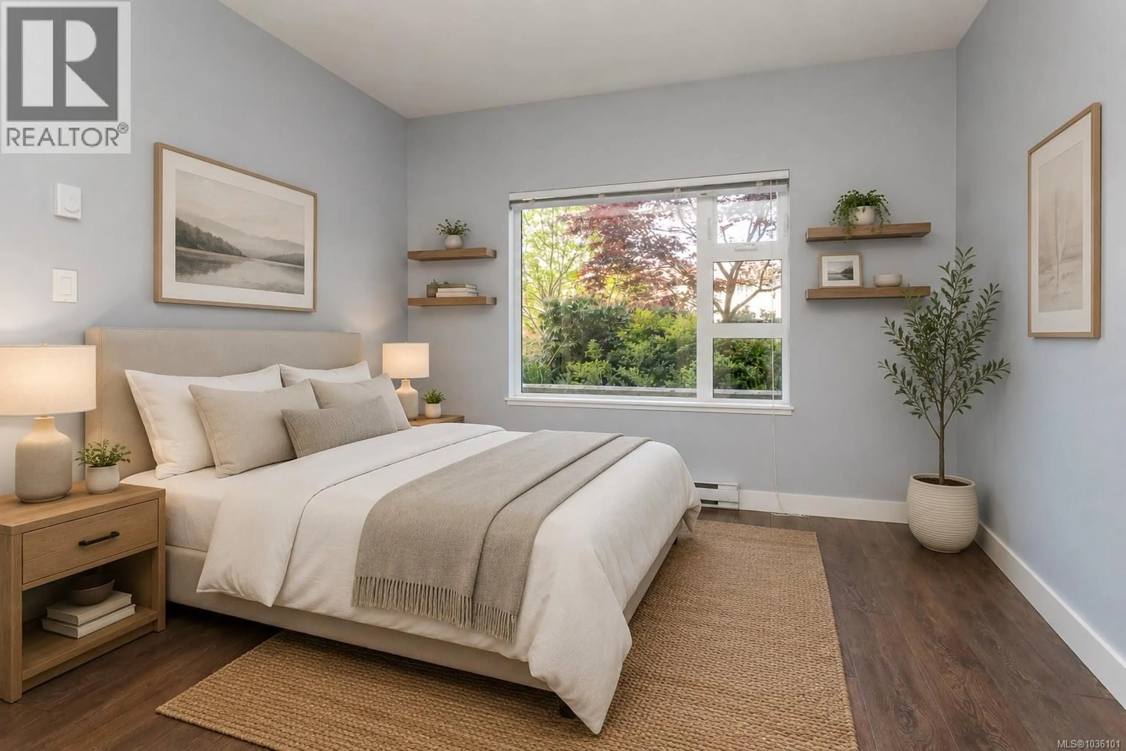 Bedroom with bed, wood/laminate floor for 102 - 3333 GLASGOW AVENUE, Saanich British Columbia V8X1M5