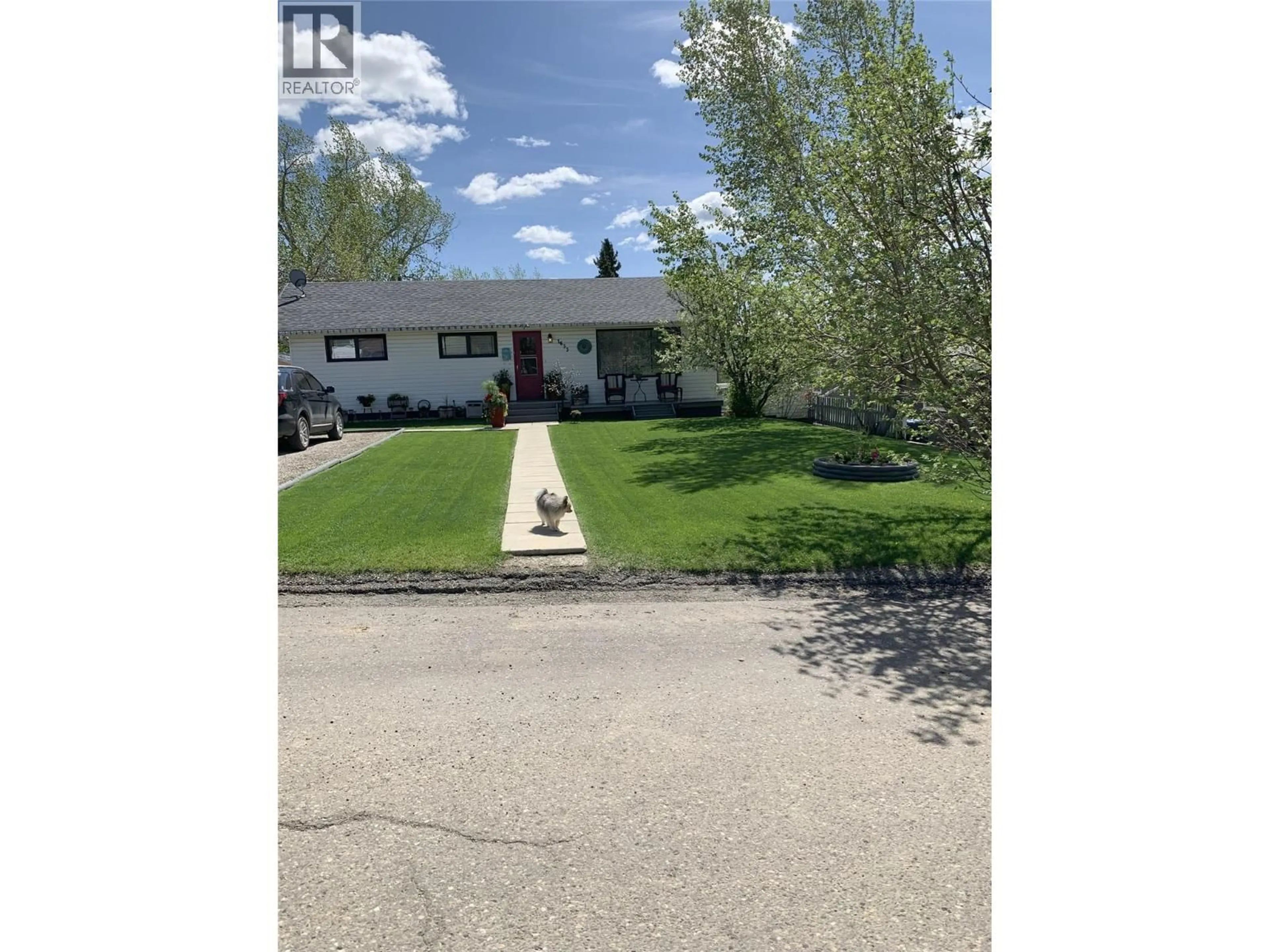 A pic from outside/outdoor area/front of a property/back of a property/a pic from drone, street for 1633 94 AVENUE, Dawson Creek British Columbia V1G1H3