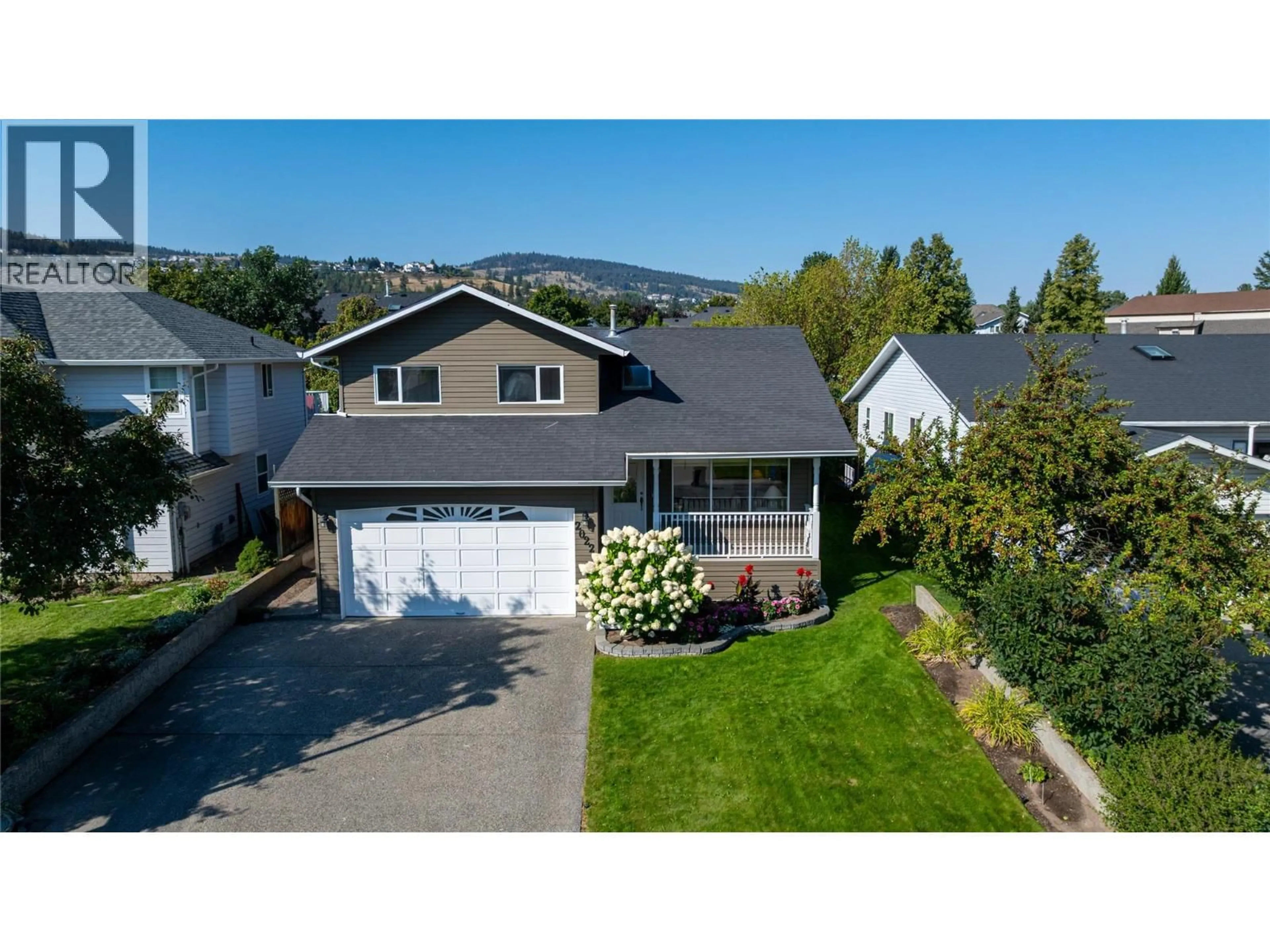 A pic from outside/outdoor area/front of a property/back of a property/a pic from drone, mountain view for 2022 TREMERTON DRIVE, Kamloops British Columbia V2E2L1