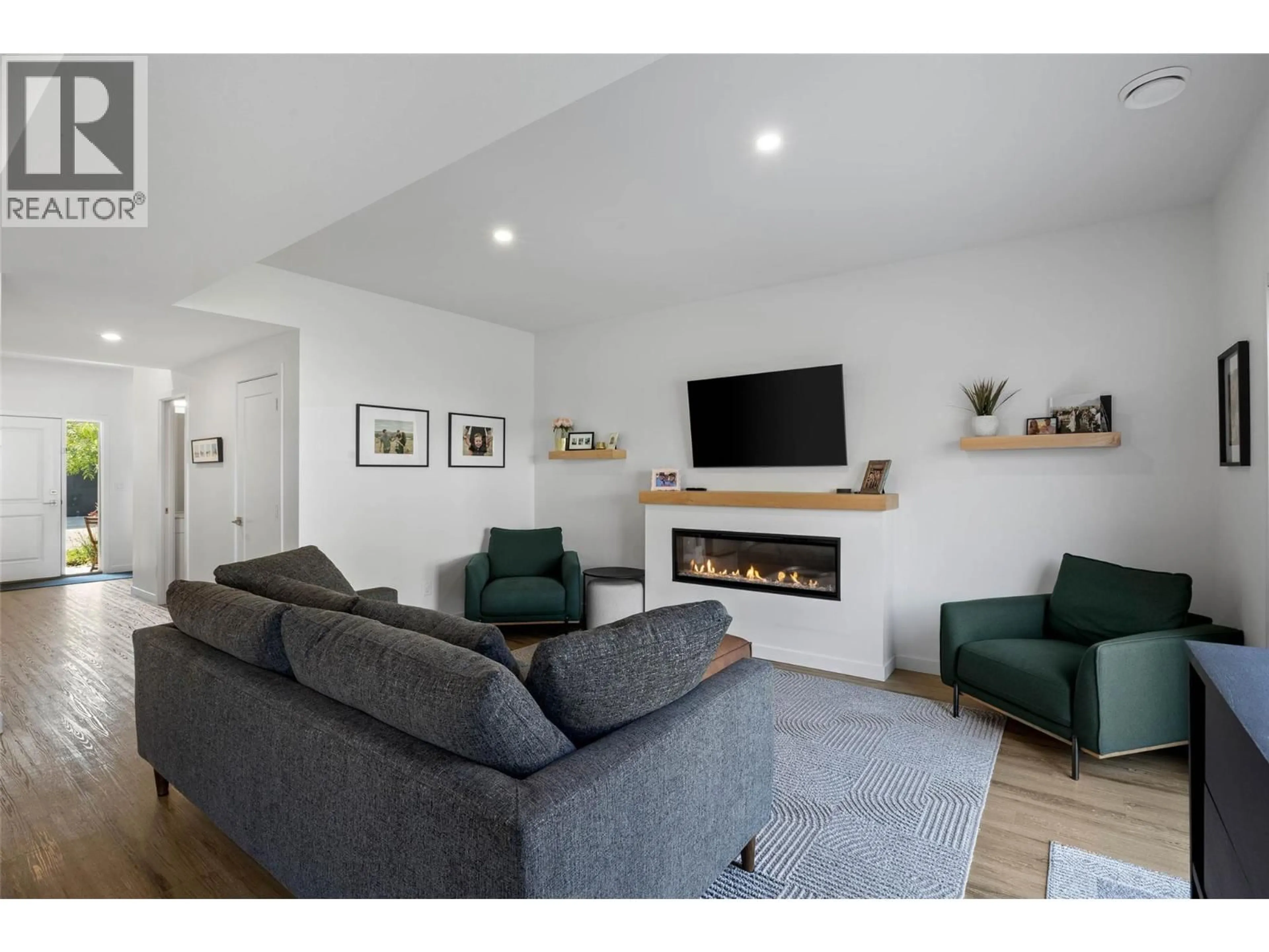 Living room with furniture, wood/laminate floor for 166 - 2683 ORD ROAD, Kamloops British Columbia V2B0J2