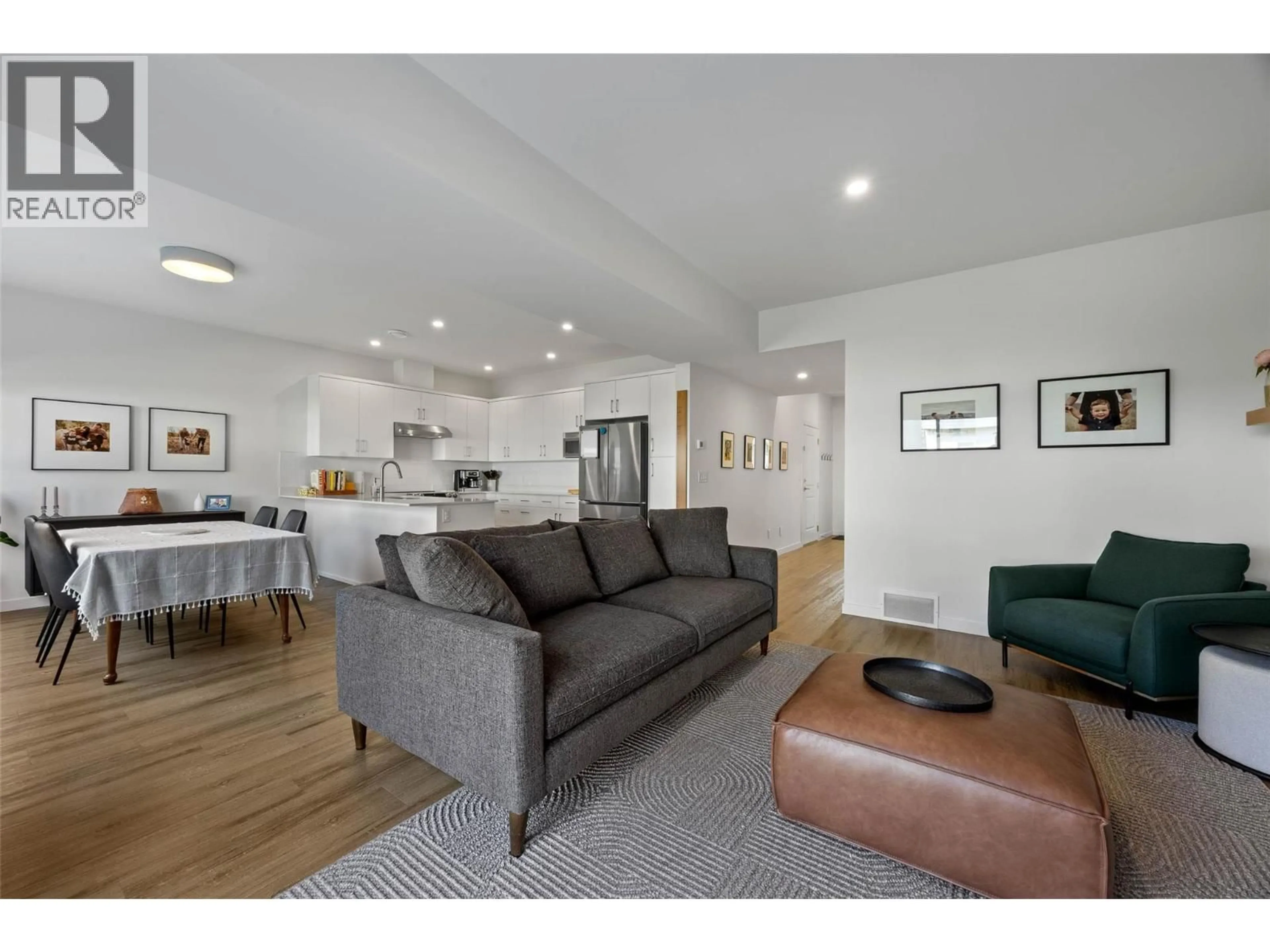 Living room with furniture, wood/laminate floor for 166 - 2683 ORD ROAD, Kamloops British Columbia V2B0J2