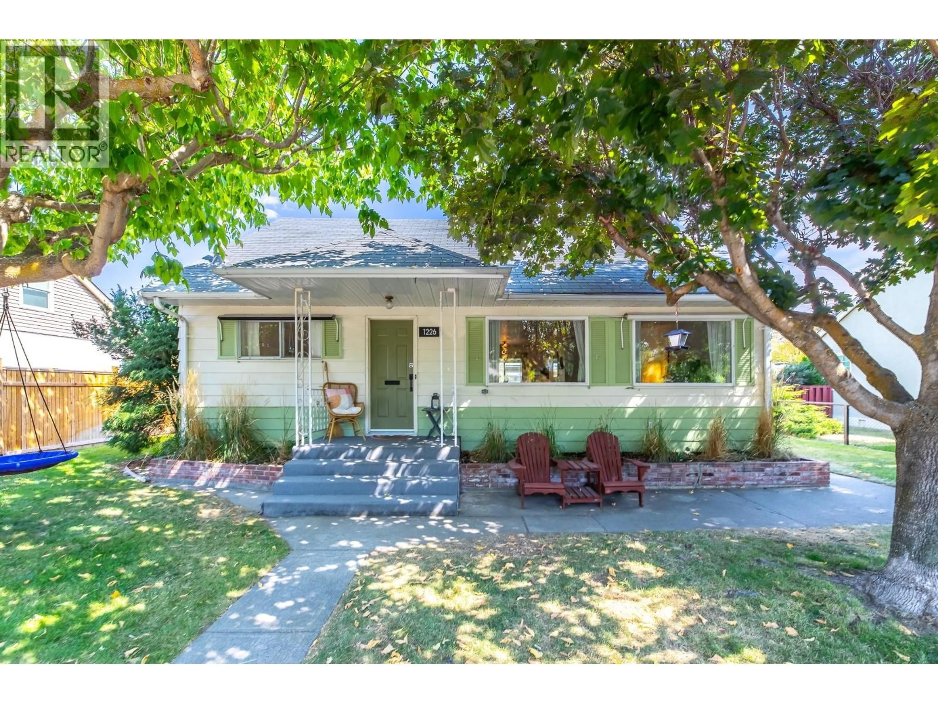 Home with vinyl exterior material, street for 1226 KILWINNING STREET, Penticton British Columbia V2A4P3