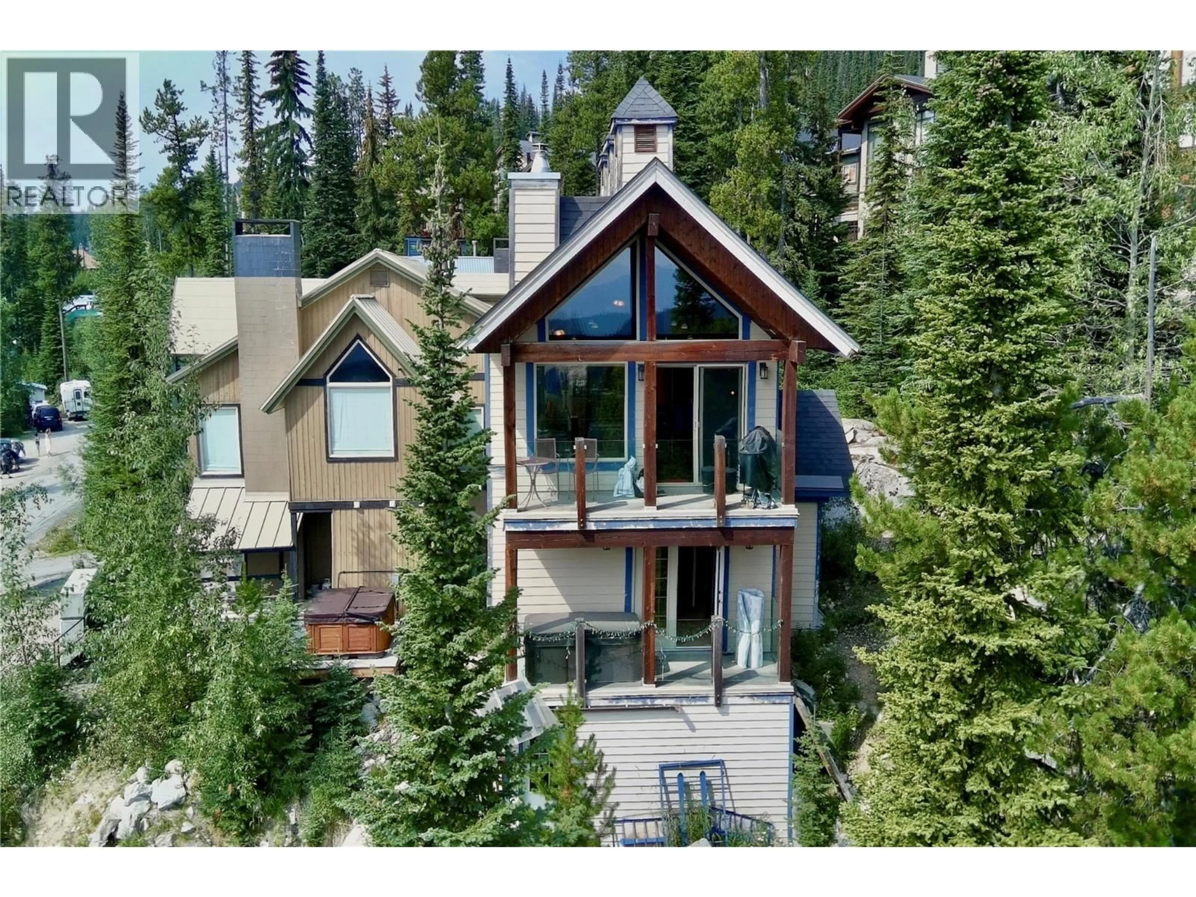 A pic from outside/outdoor area/front of a property/back of a property/a pic from drone, unknown for 5890 SNOW PINES CRESCENT, Big White British Columbia V1P1P3