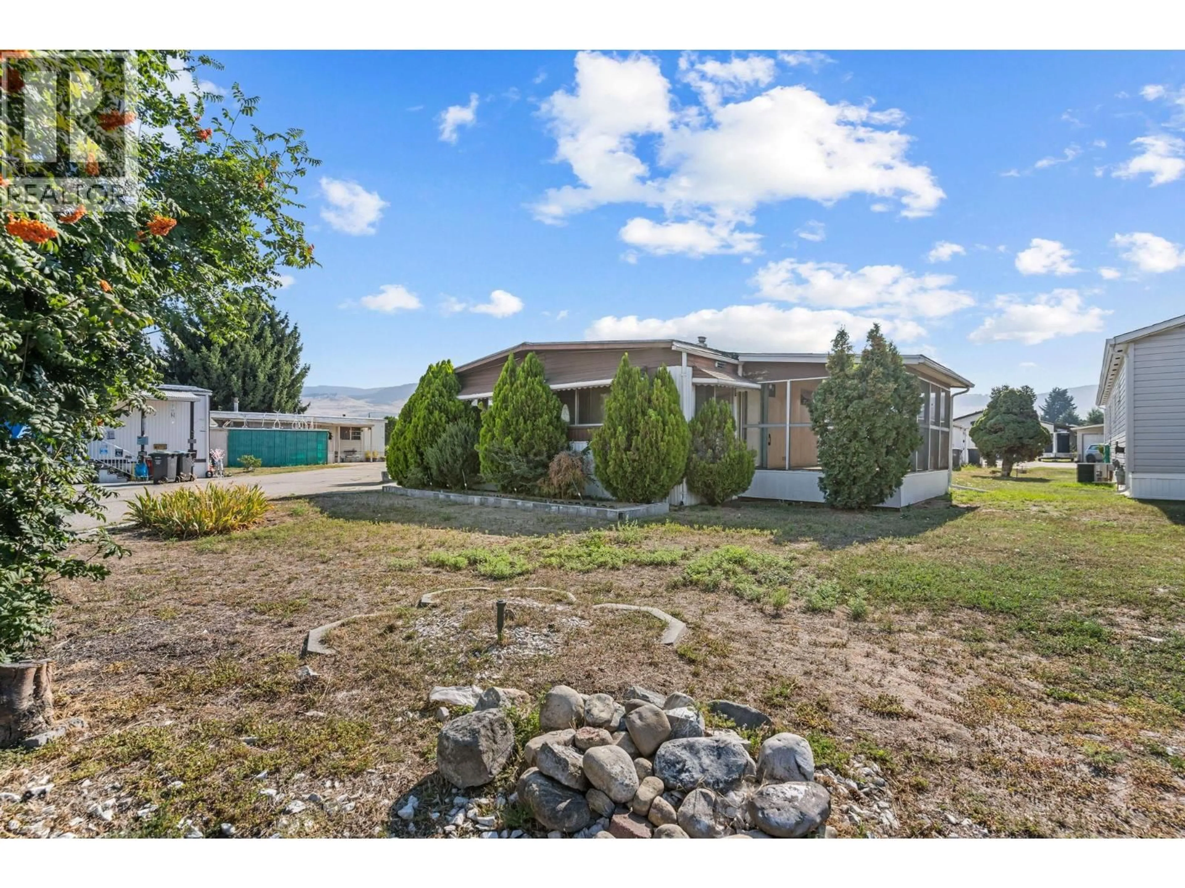 A pic from outside/outdoor area/front of a property/back of a property/a pic from drone, unknown for 108 - 1133 FINDLAY ROAD, Kelowna British Columbia V1X5A9