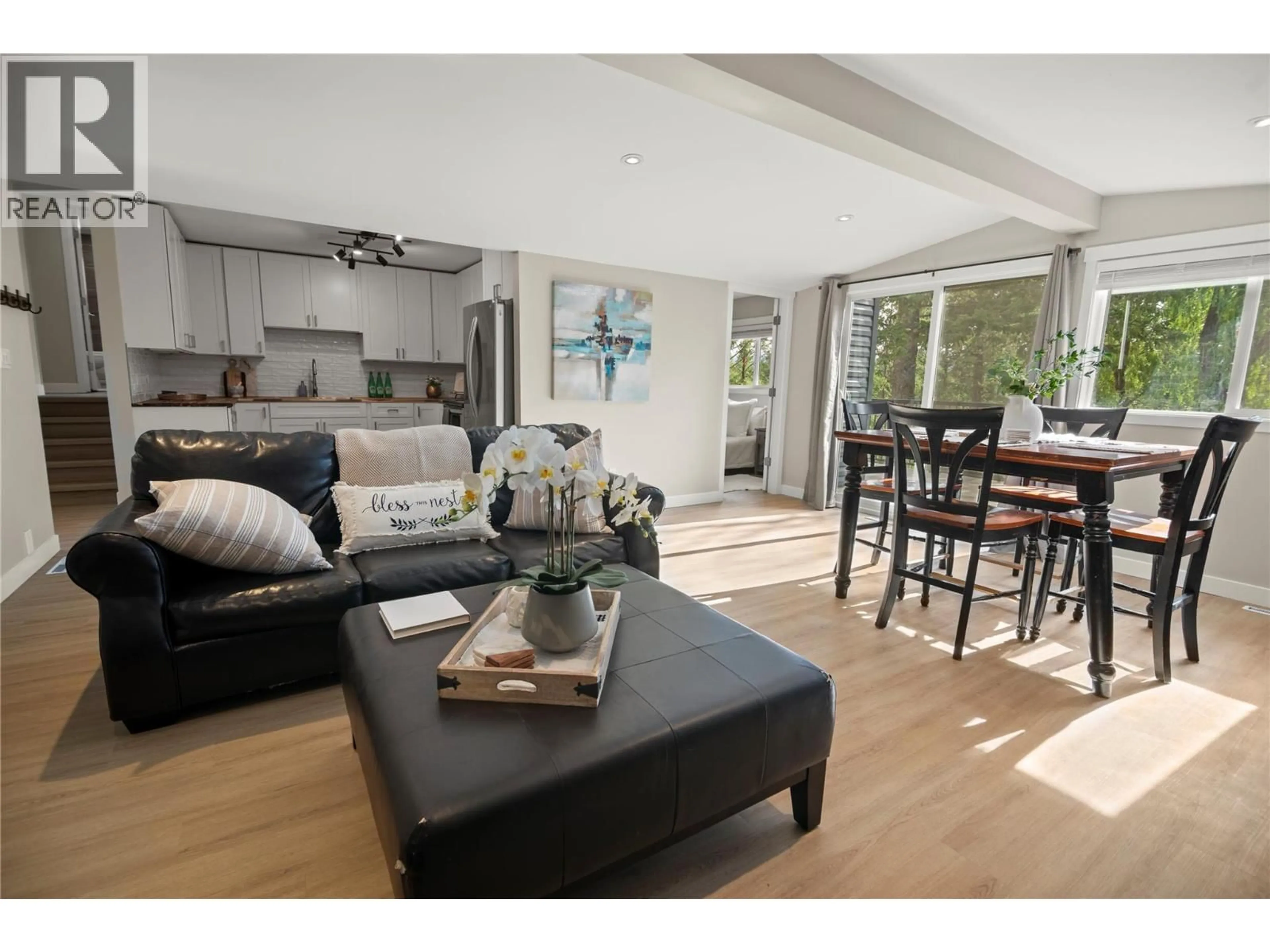 Open concept kitchen, wood/laminate floor for 1737 13TH AVENUE, Invermere British Columbia V0A1K4