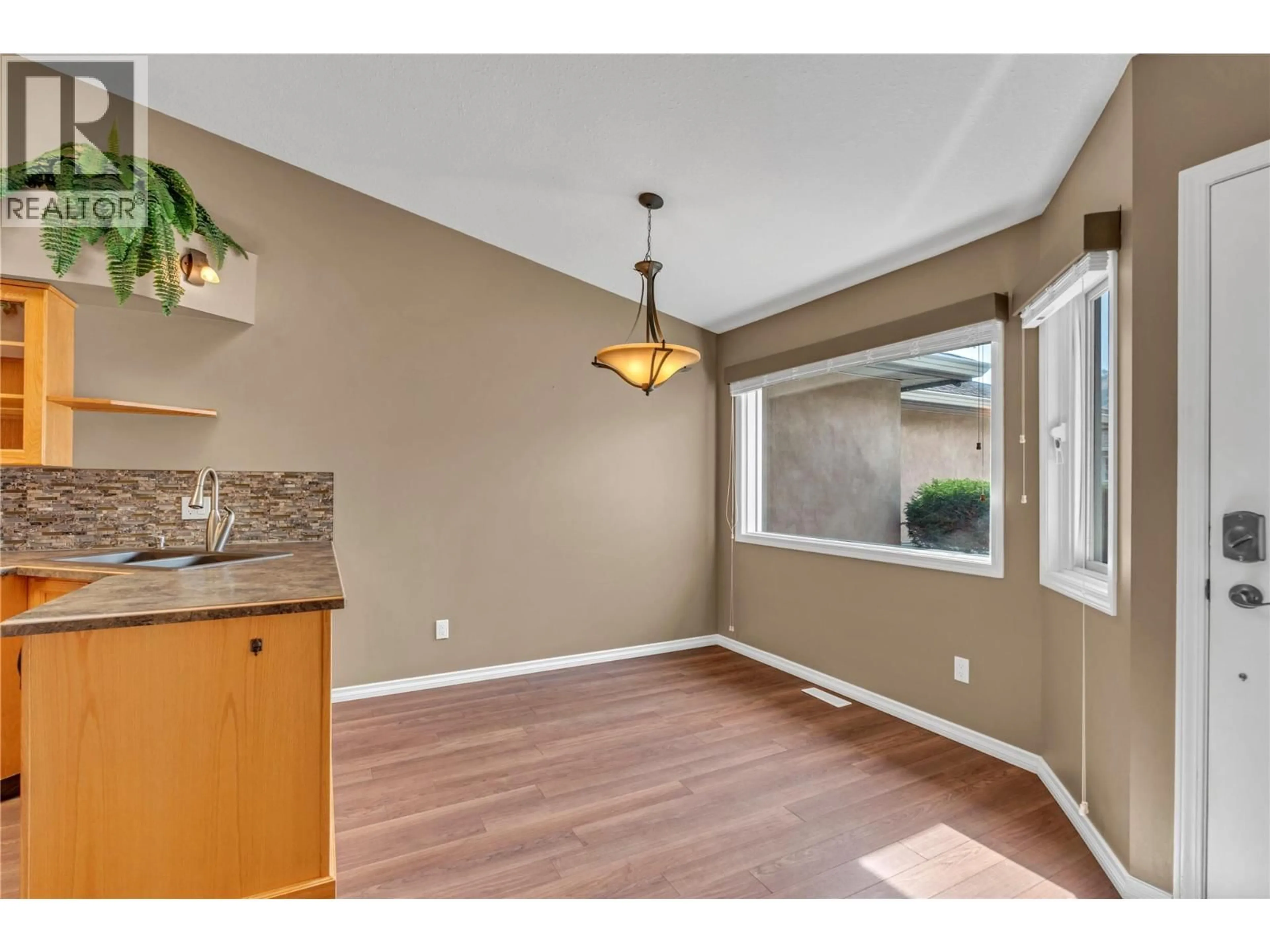 Open concept kitchen, wood/laminate floor for 14 - 8700 JUBILEE ROAD, Summerland British Columbia V0H1Z5