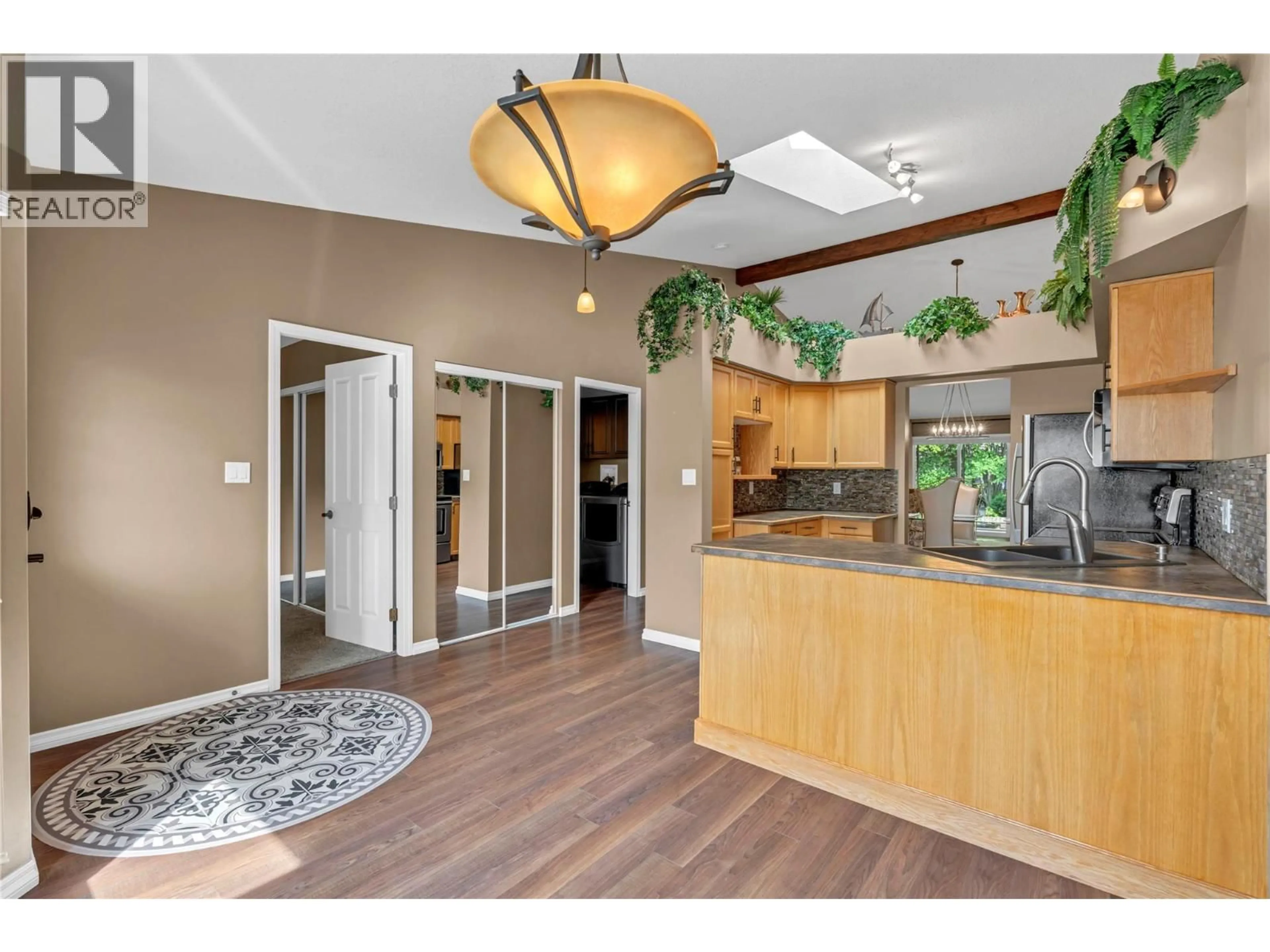 Open concept kitchen, wood/laminate floor for 14 - 8700 JUBILEE ROAD, Summerland British Columbia V0H1Z5