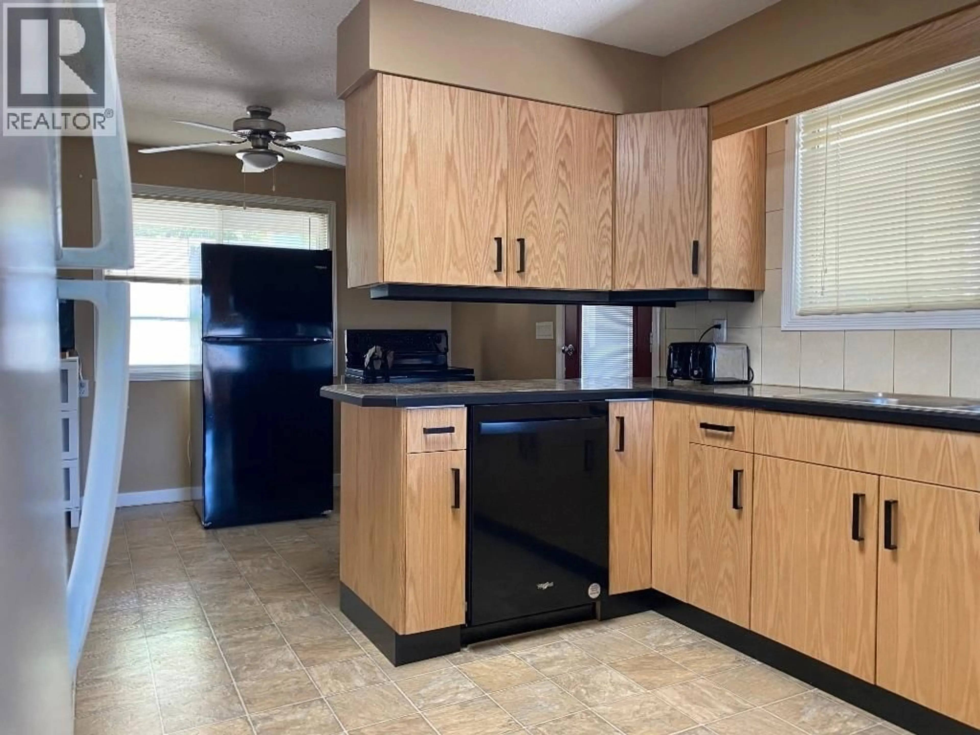 Standard kitchen, ceramic/tile floor for 7437 VALLEY HEIGHTS DRIVE, Grand Forks British Columbia V0H1H0