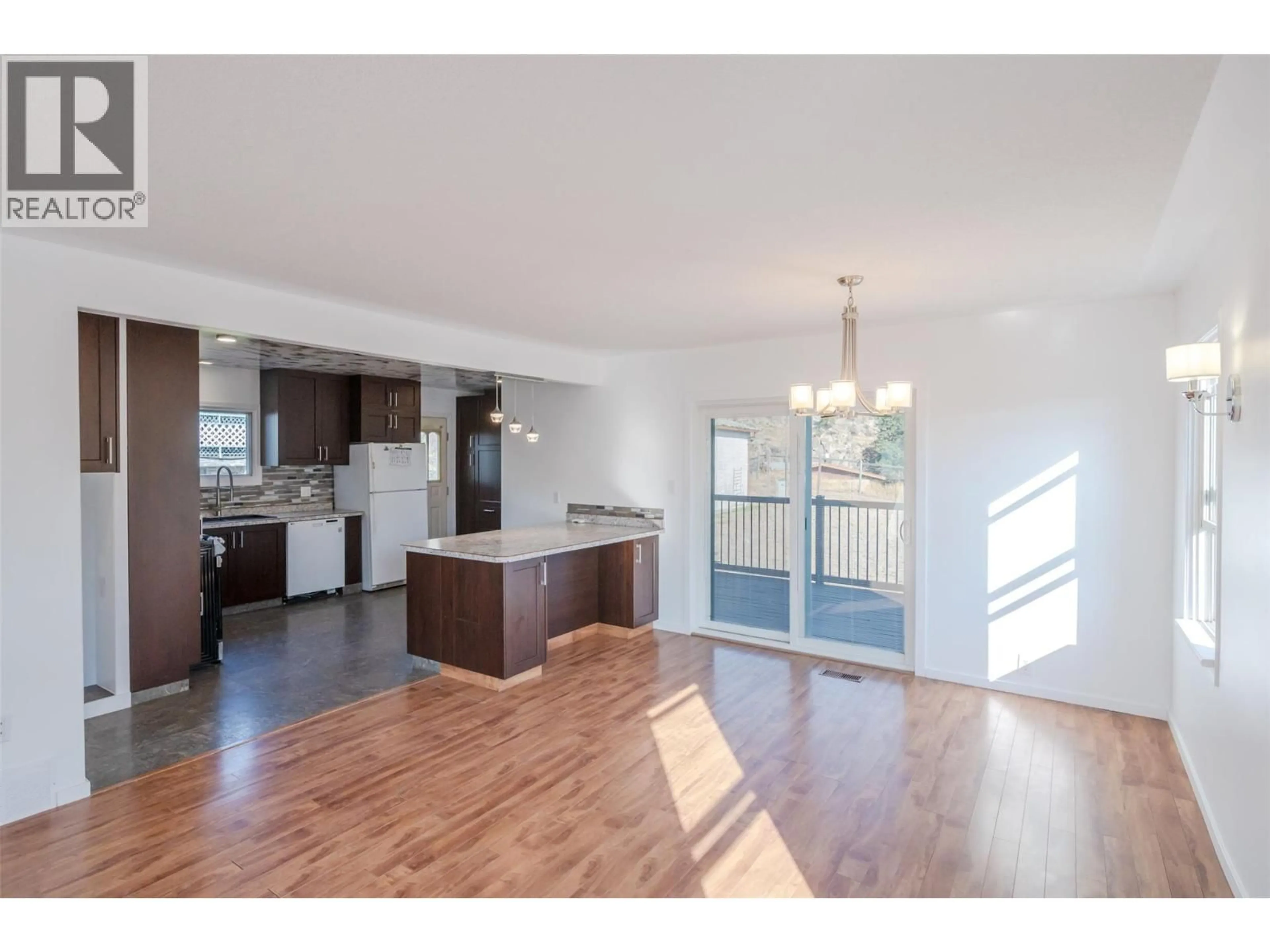 Open concept kitchen, wood/laminate floor for 6556 KOOTENAY STREET, Oliver British Columbia V0H1T0