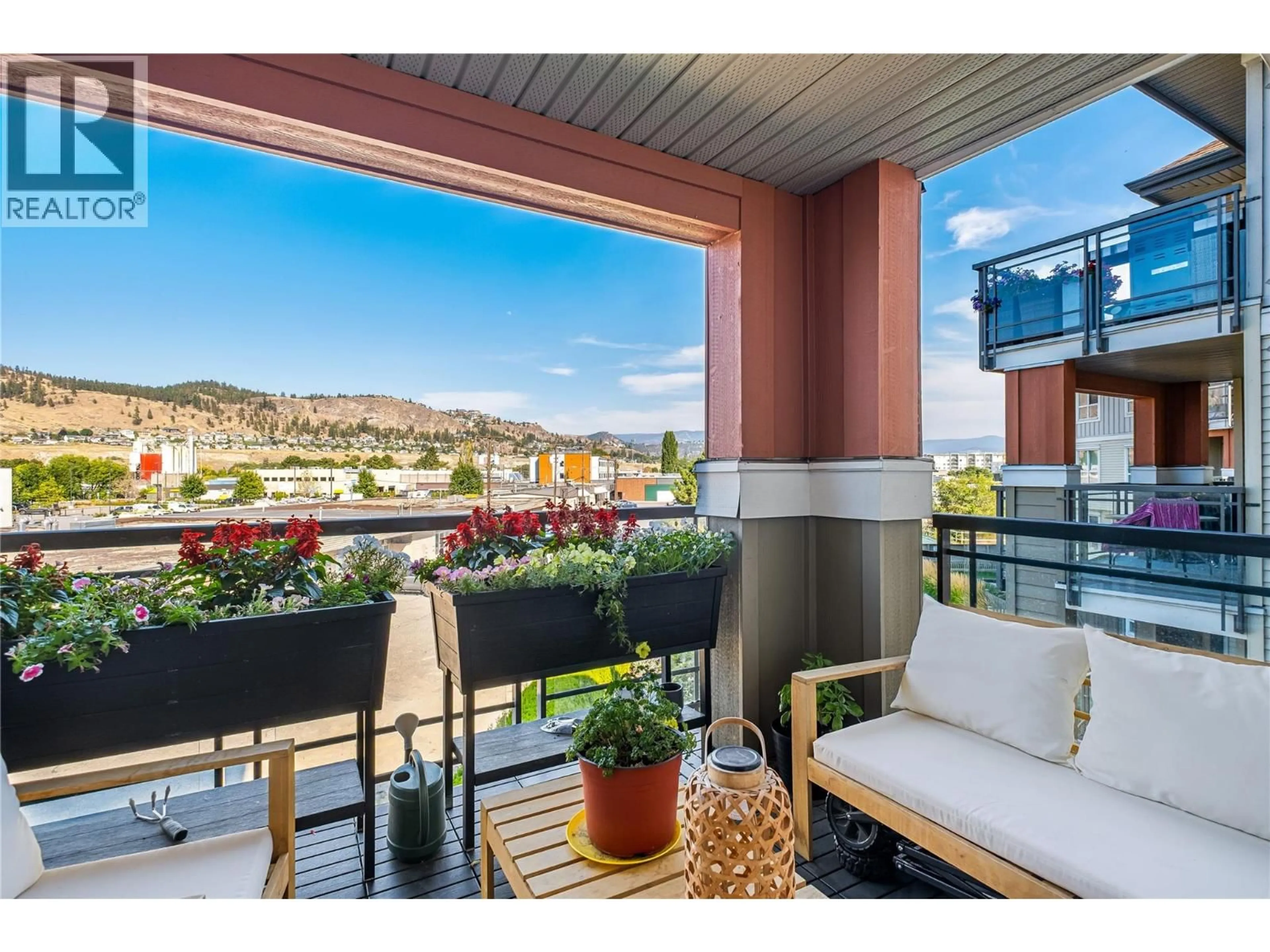 Balcony in the apartment, water/lake/river/ocean view for 307 - 1093 SUNSET DRIVE, Kelowna British Columbia V1Y9Z4