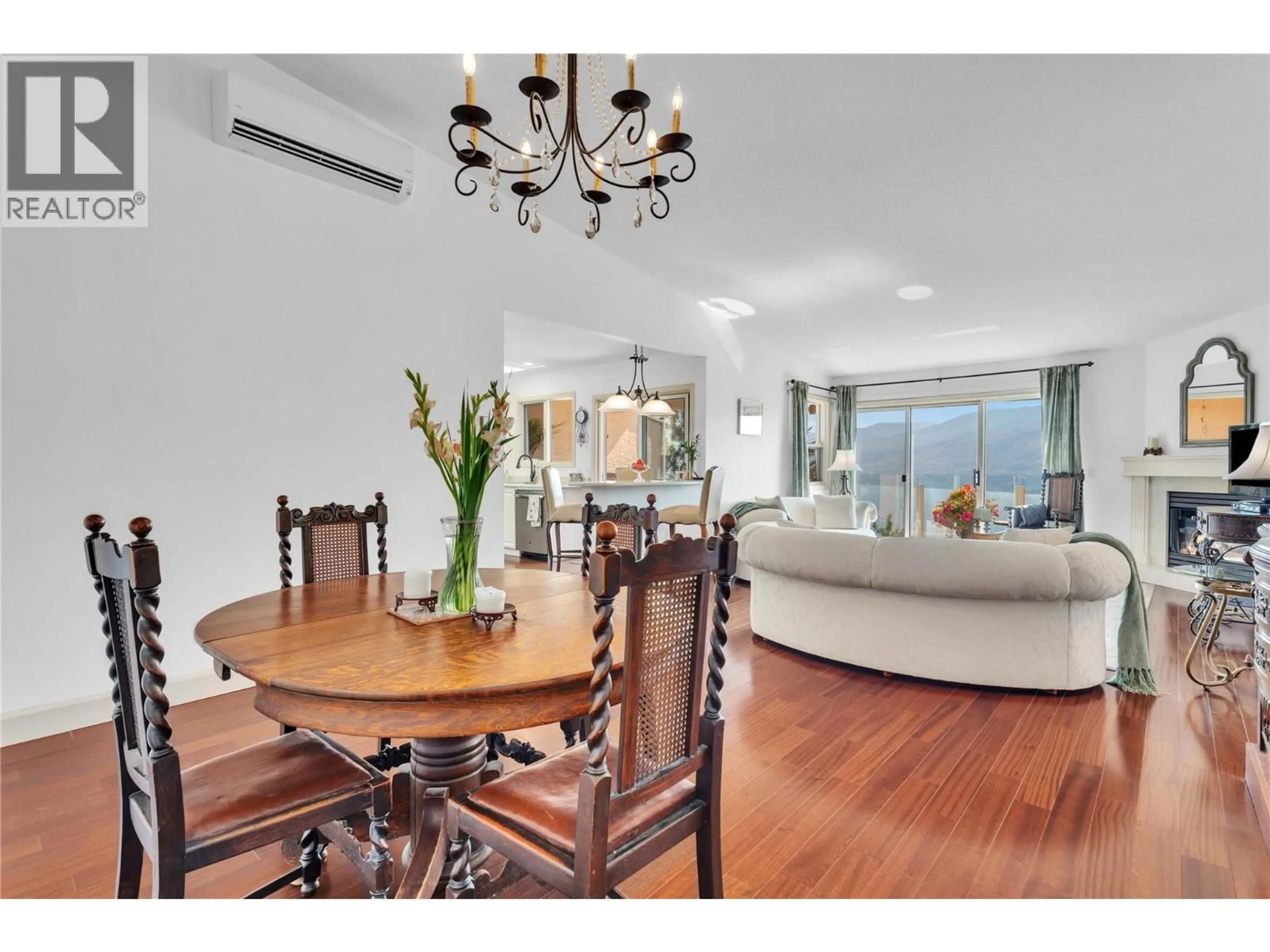 Dining room, wood/laminate floor for 203 - 4450 PONDEROSA DRIVE, Peachland British Columbia V0H1X5