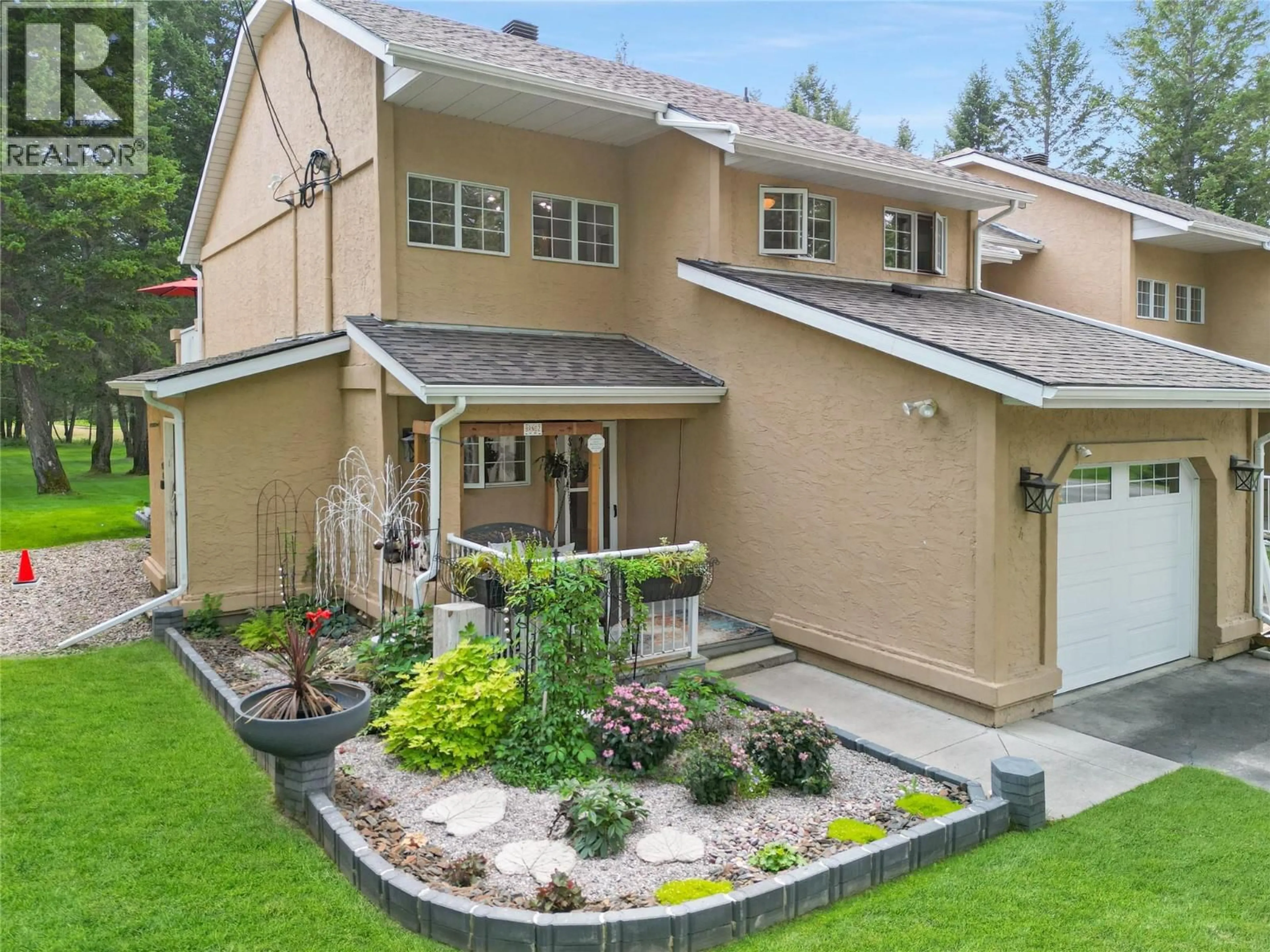Home with vinyl exterior material, street for 4 - 4850 MCKAY STREET, Radium Hot Springs British Columbia V0A1M0