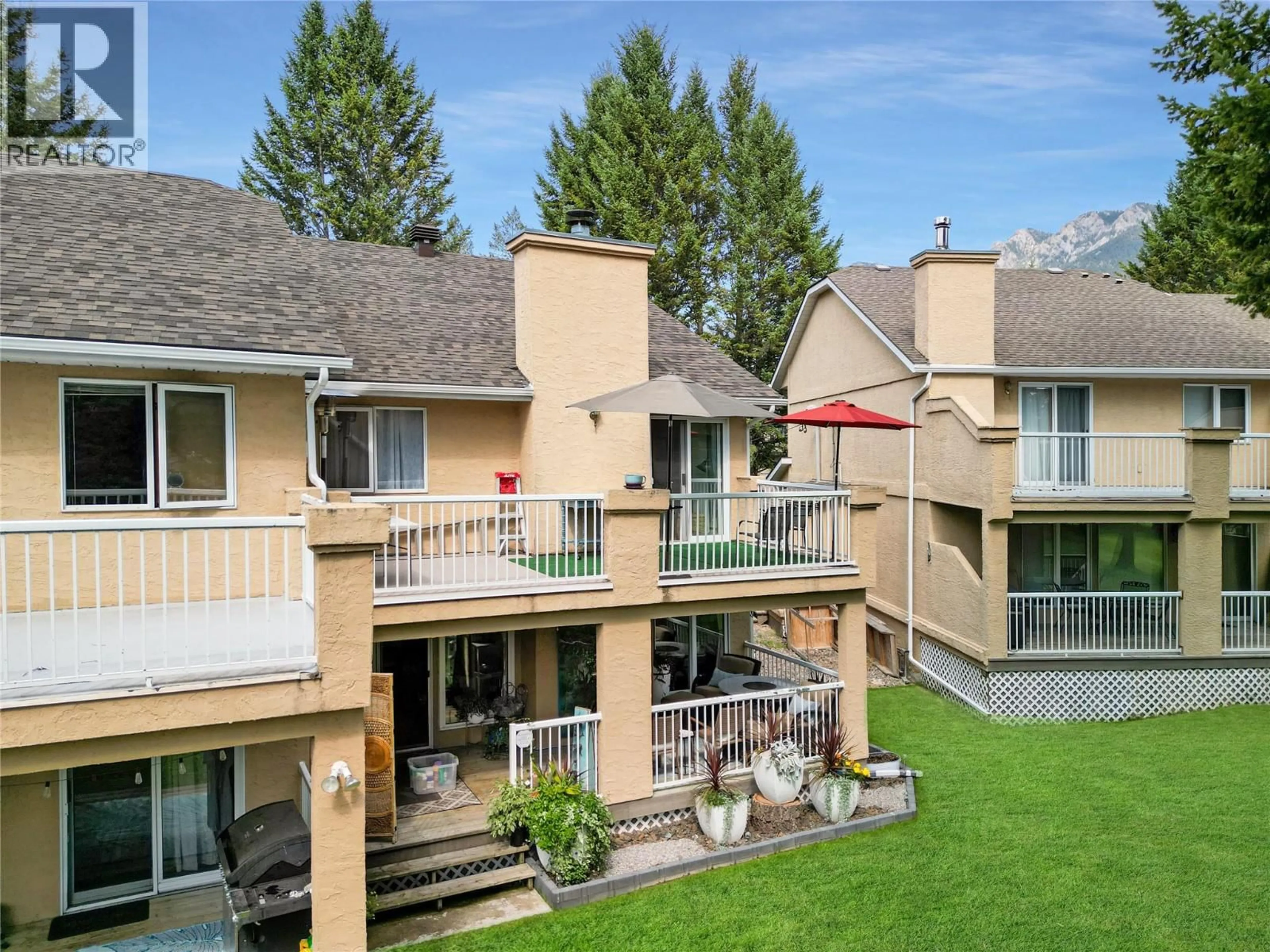 A pic from outside/outdoor area/front of a property/back of a property/a pic from drone, mountain view for 4 - 4850 MCKAY STREET, Radium Hot Springs British Columbia V0A1M0