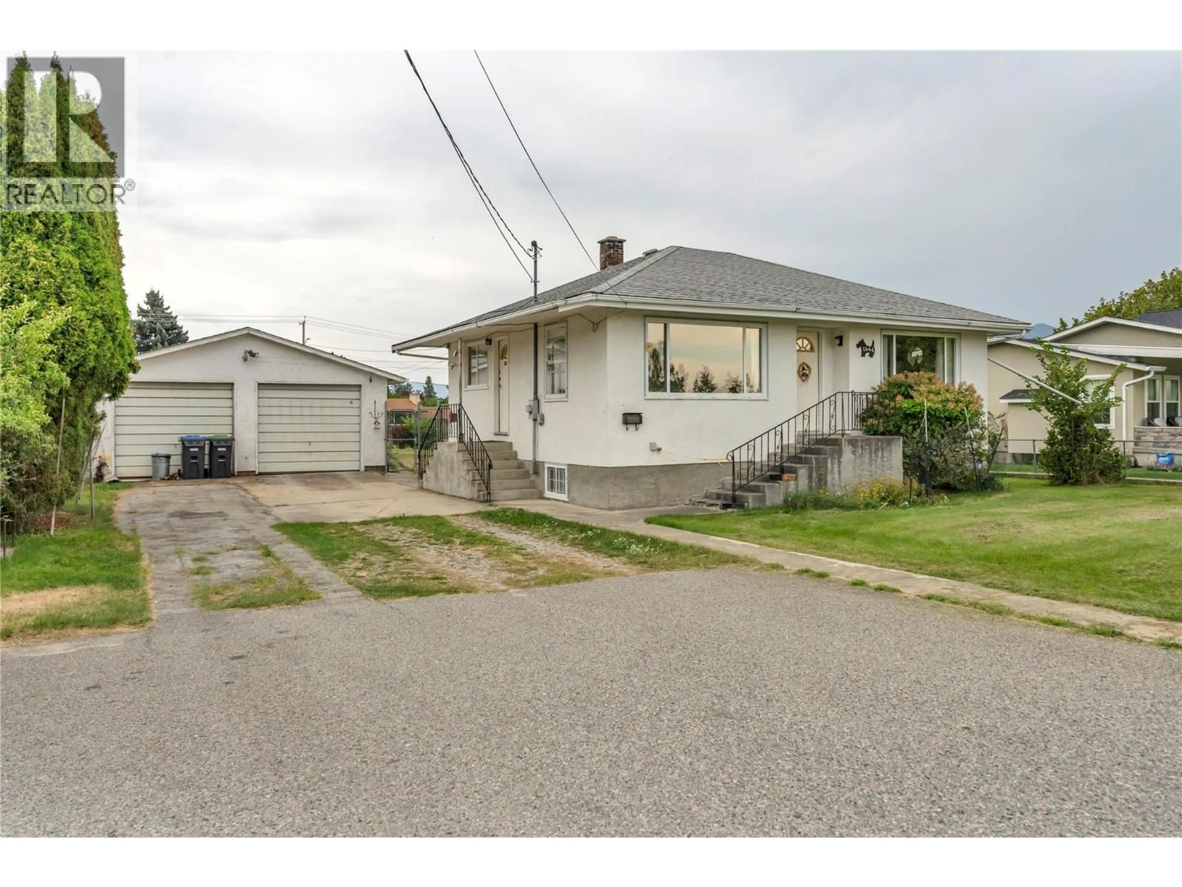 A pic from outside/outdoor area/front of a property/back of a property/a pic from drone, street for 1444 RIDGEDALE AVENUE, Penticton British Columbia V2A2S2