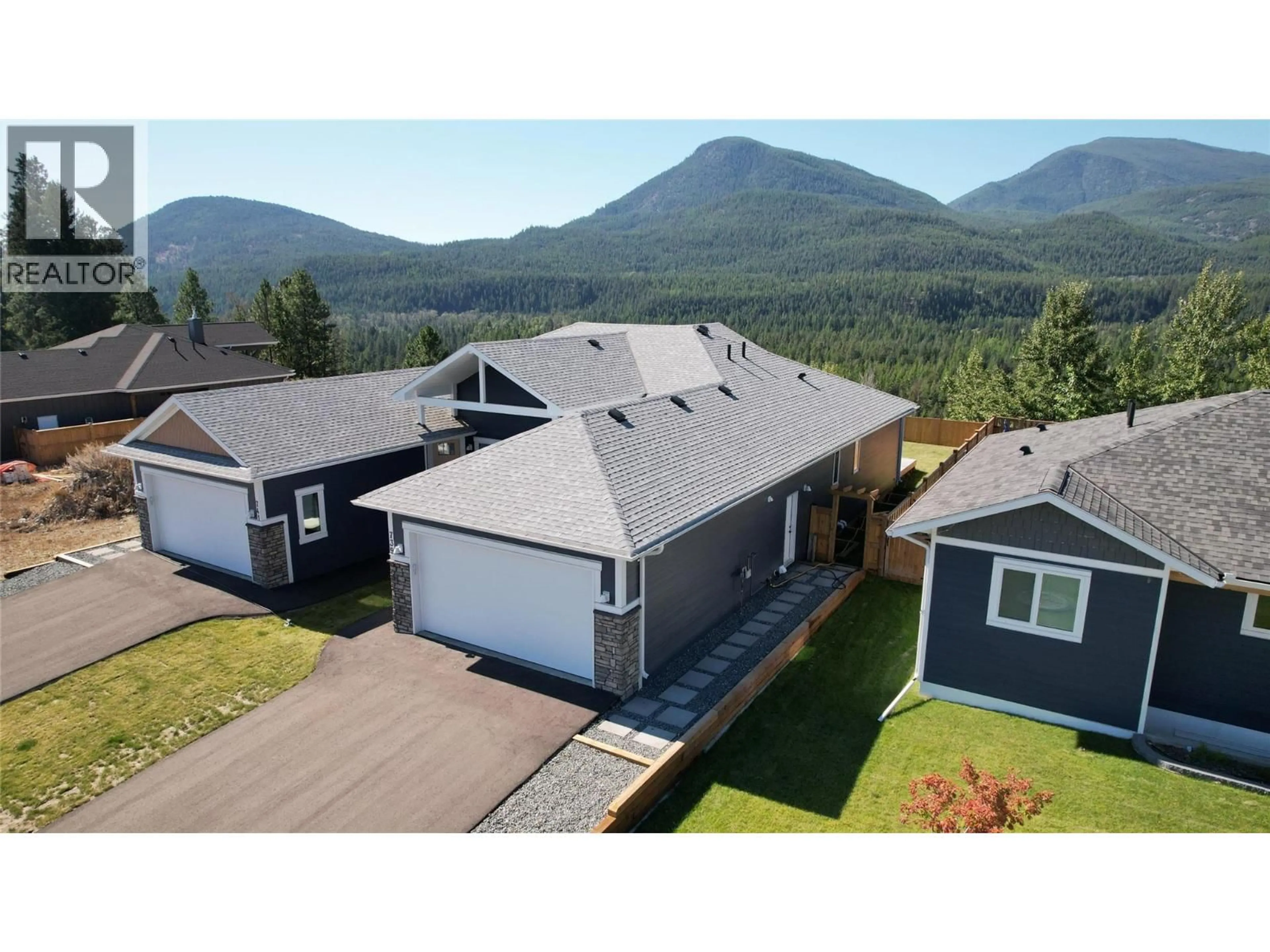 A pic from outside/outdoor area/front of a property/back of a property/a pic from drone, mountain view for 739 ST MARY RIVER DRIVE, Kimberley British Columbia V1A3J3