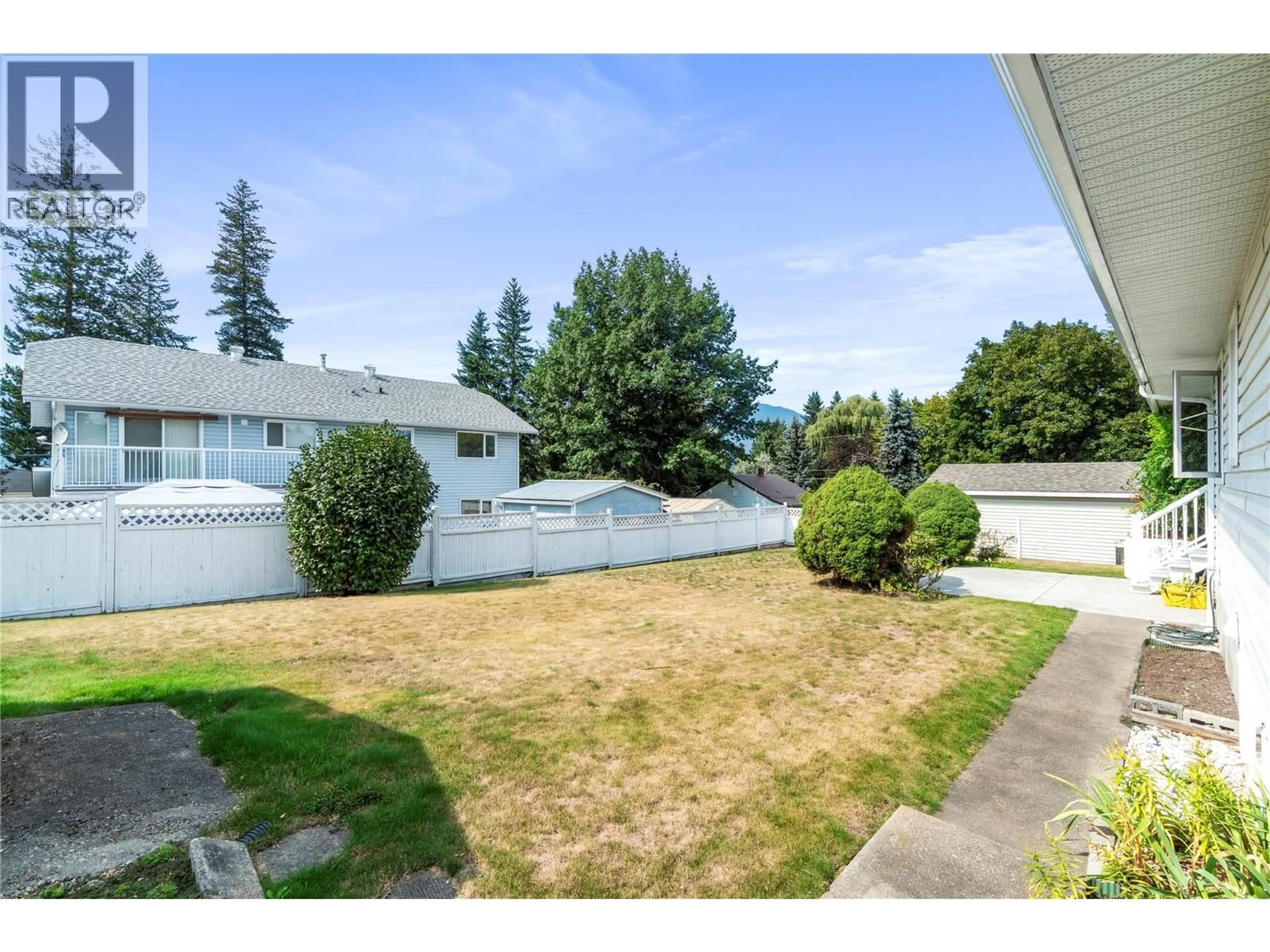 A pic from outside/outdoor area/front of a property/back of a property/a pic from drone, unknown for 2081 13TH STREET SOUTHWEST, Salmon Arm British Columbia V1E1L6