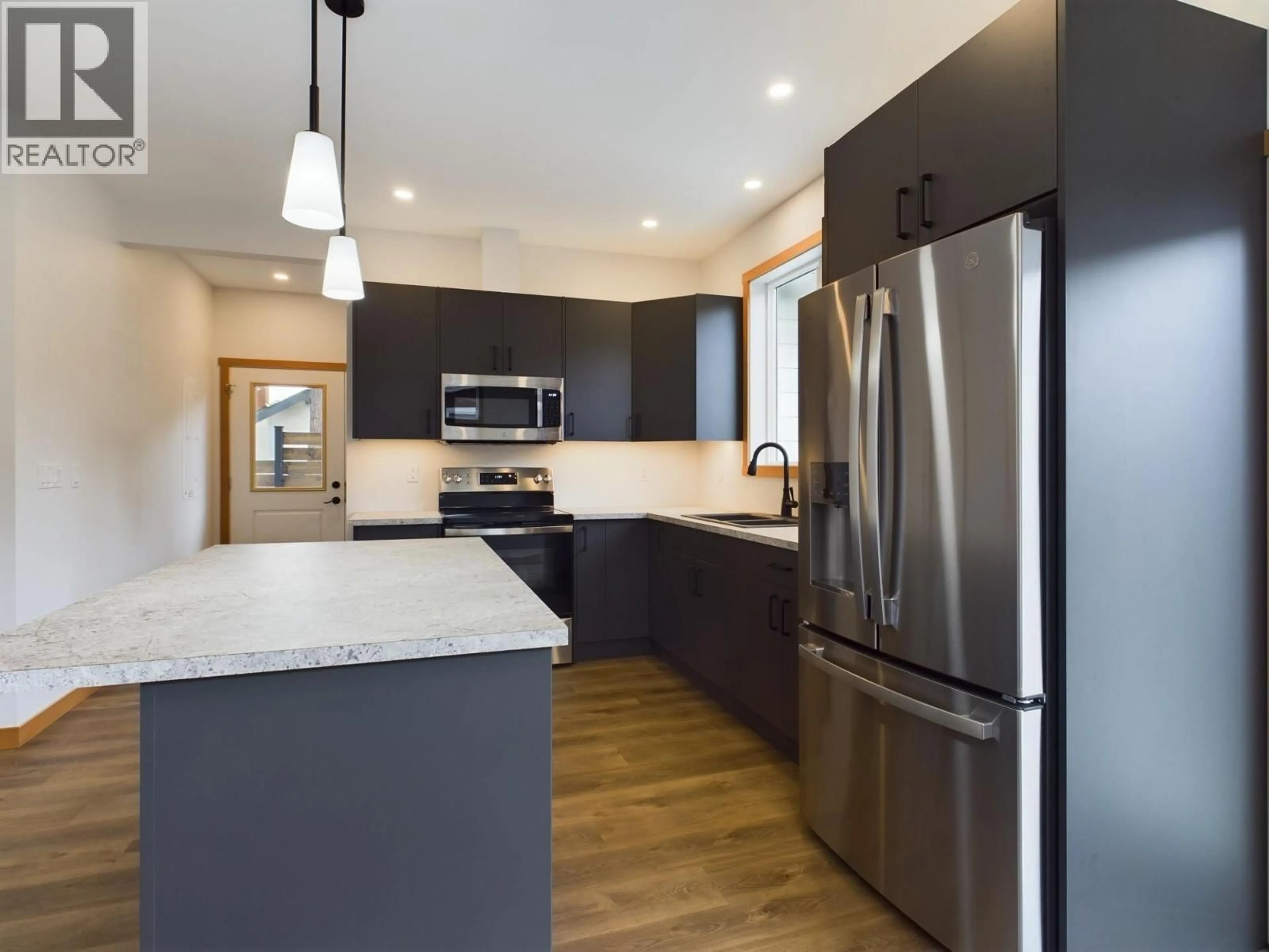 Open concept kitchen, unknown for 555 EARLE CRESCENT, Oliver British Columbia V0H1T0