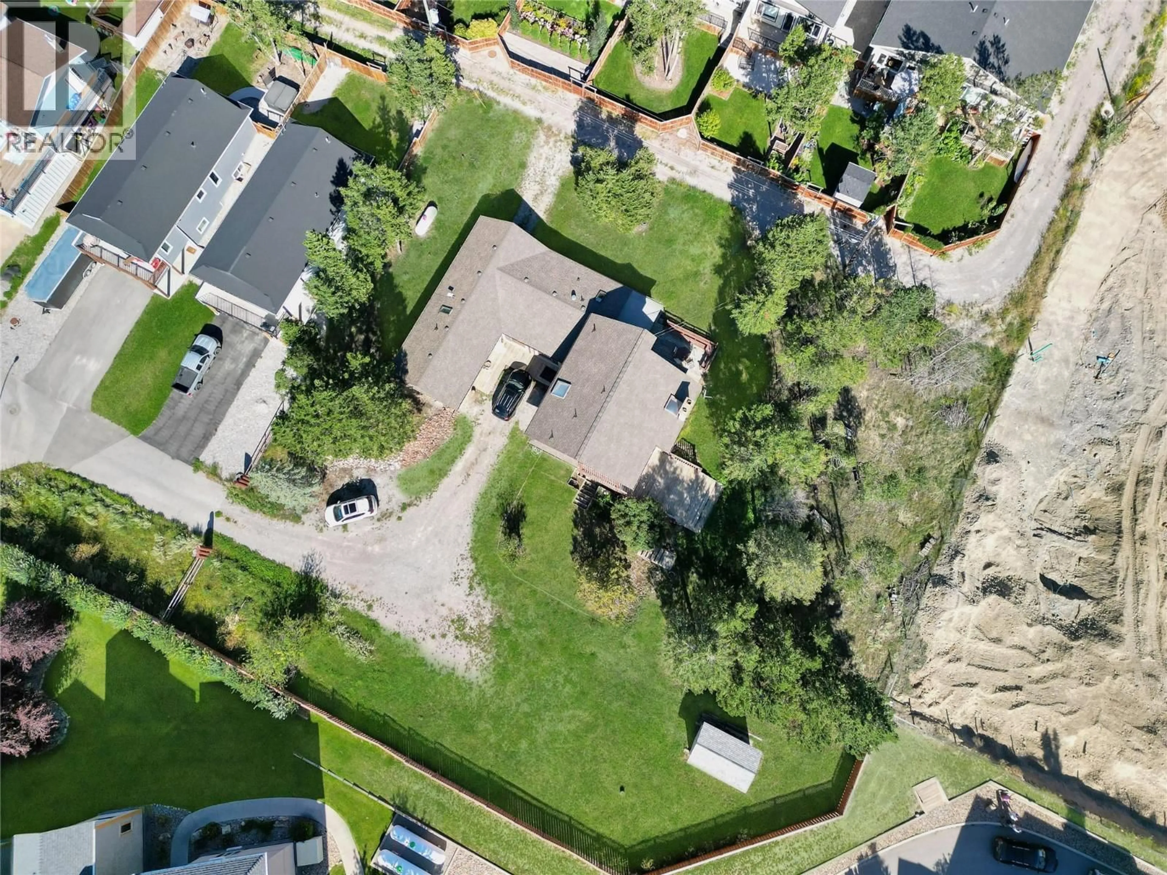 A pic from outside/outdoor area/front of a property/back of a property/a pic from drone, street for 7560 JACKSON AVENUE, Radium Hot Springs British Columbia V0A1M0