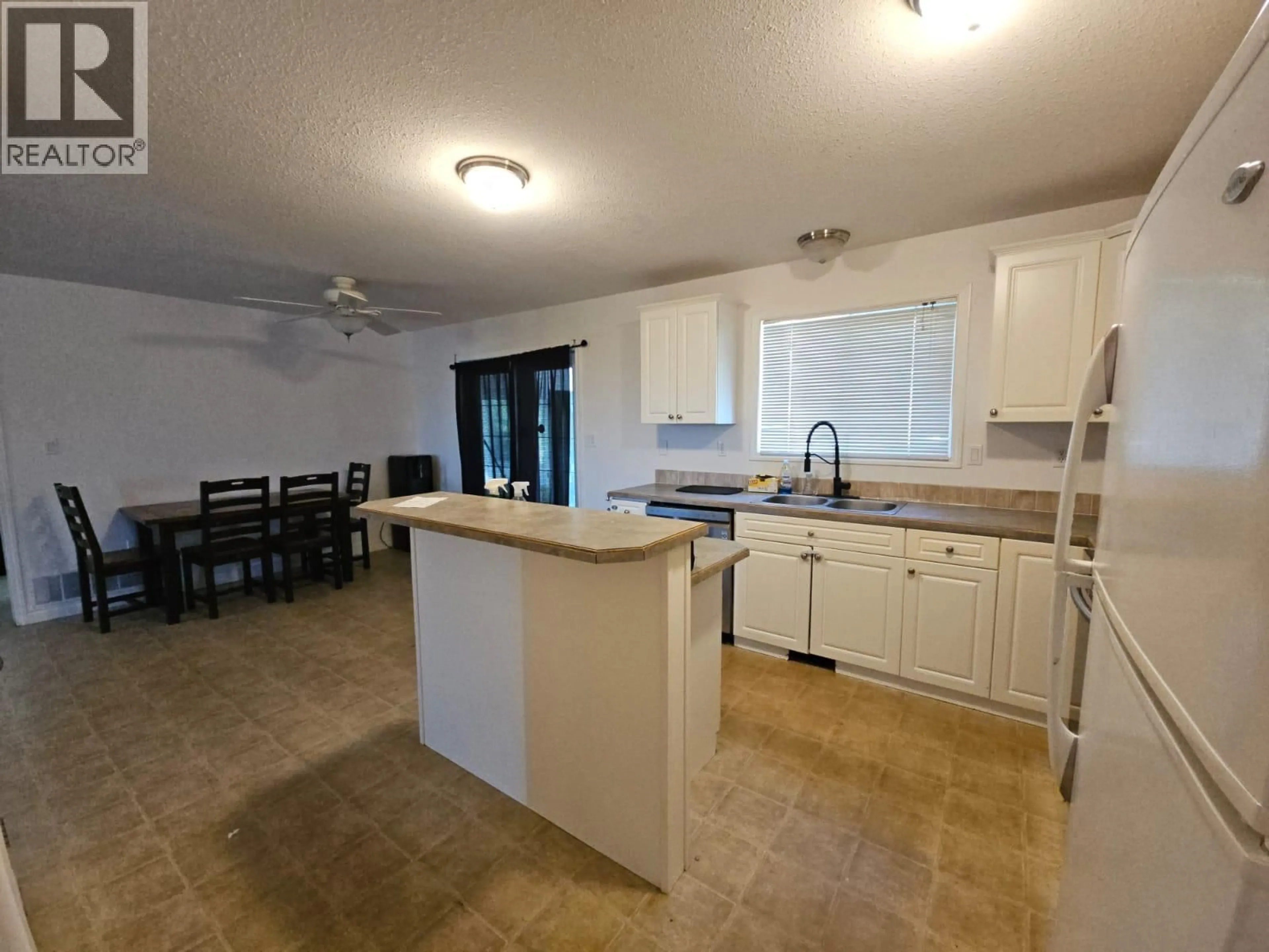 Open concept kitchen, unknown for 5200 45 AVENUE, Chetwynd British Columbia V0C1J0