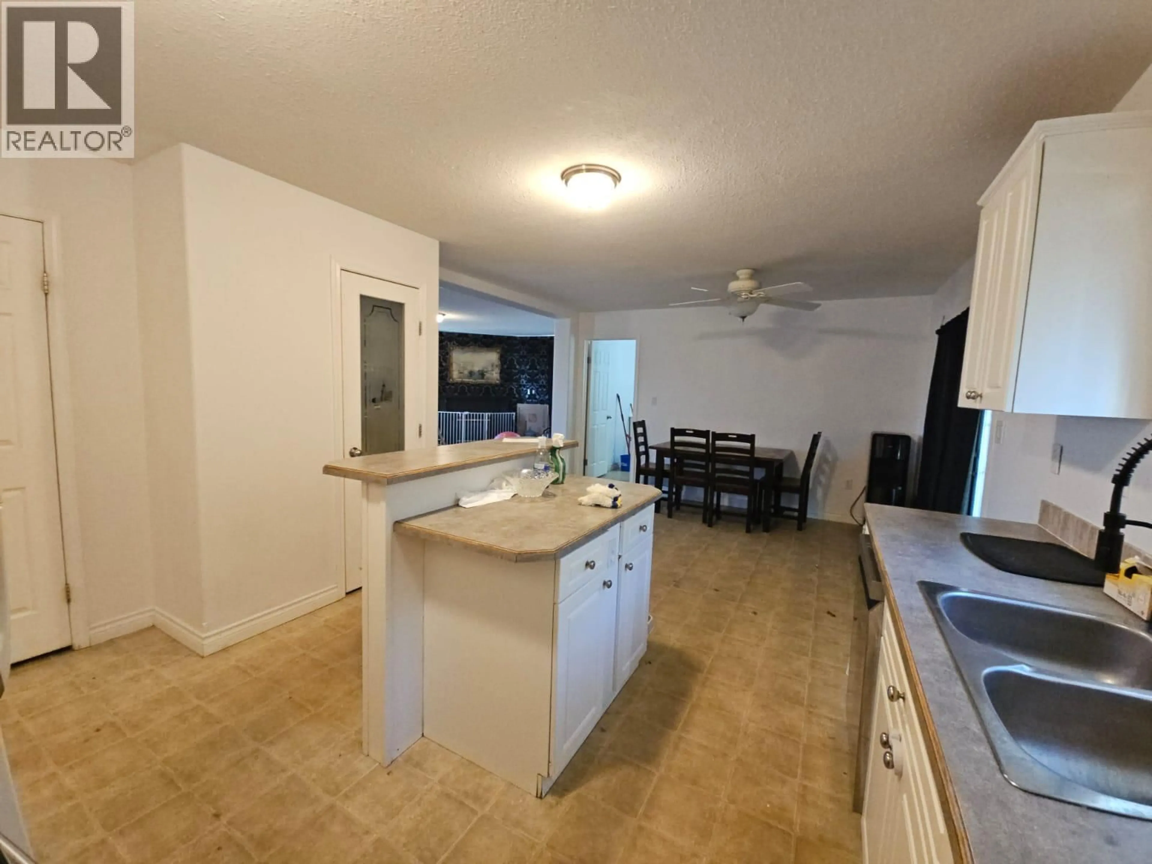 Open concept kitchen, ceramic/tile floor for 5200 45 AVENUE, Chetwynd British Columbia V0C1J0