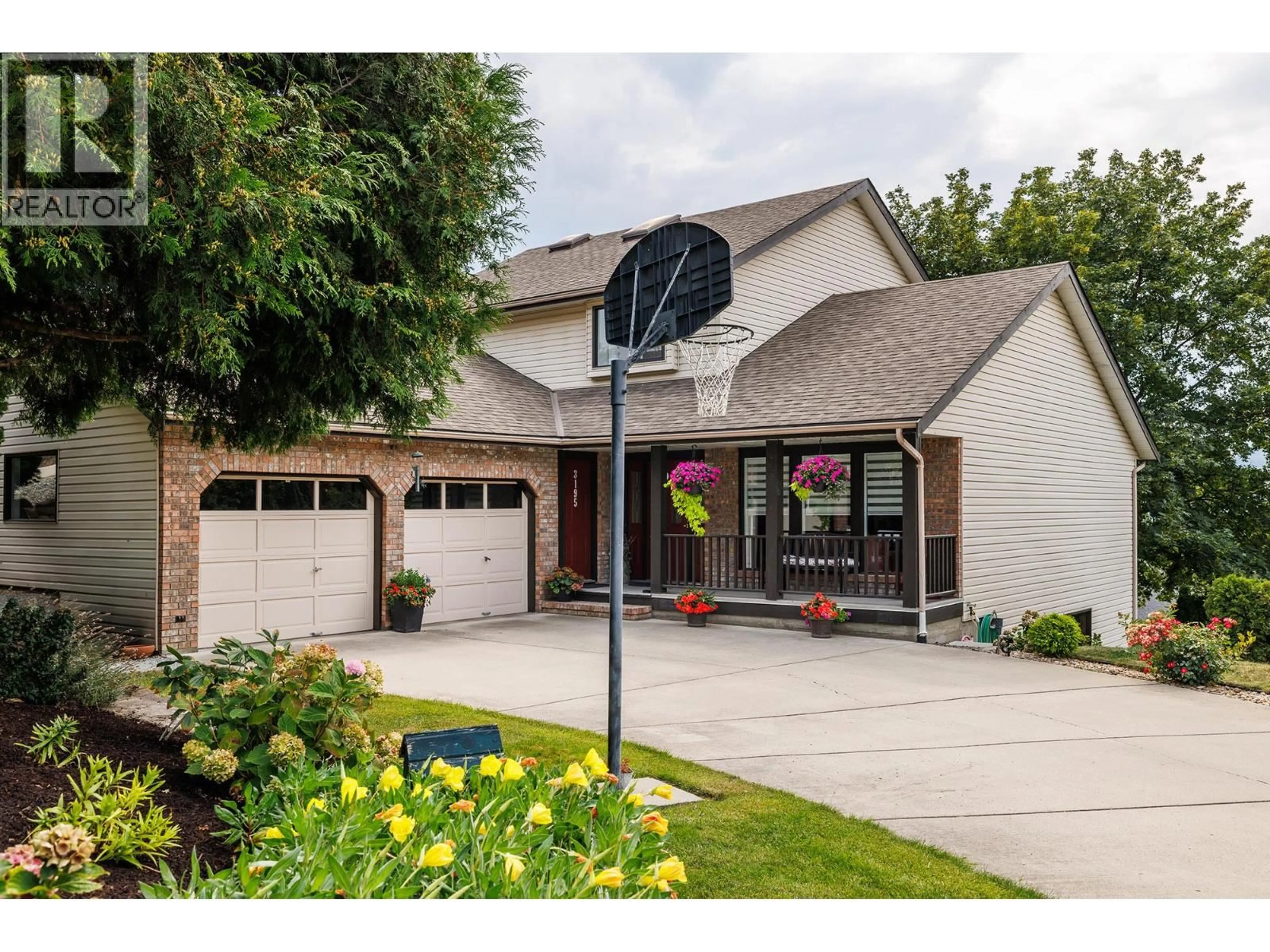 Home with vinyl exterior material, street for 3195 SAGEBRUSH COURT, West Kelowna British Columbia V4T2G6