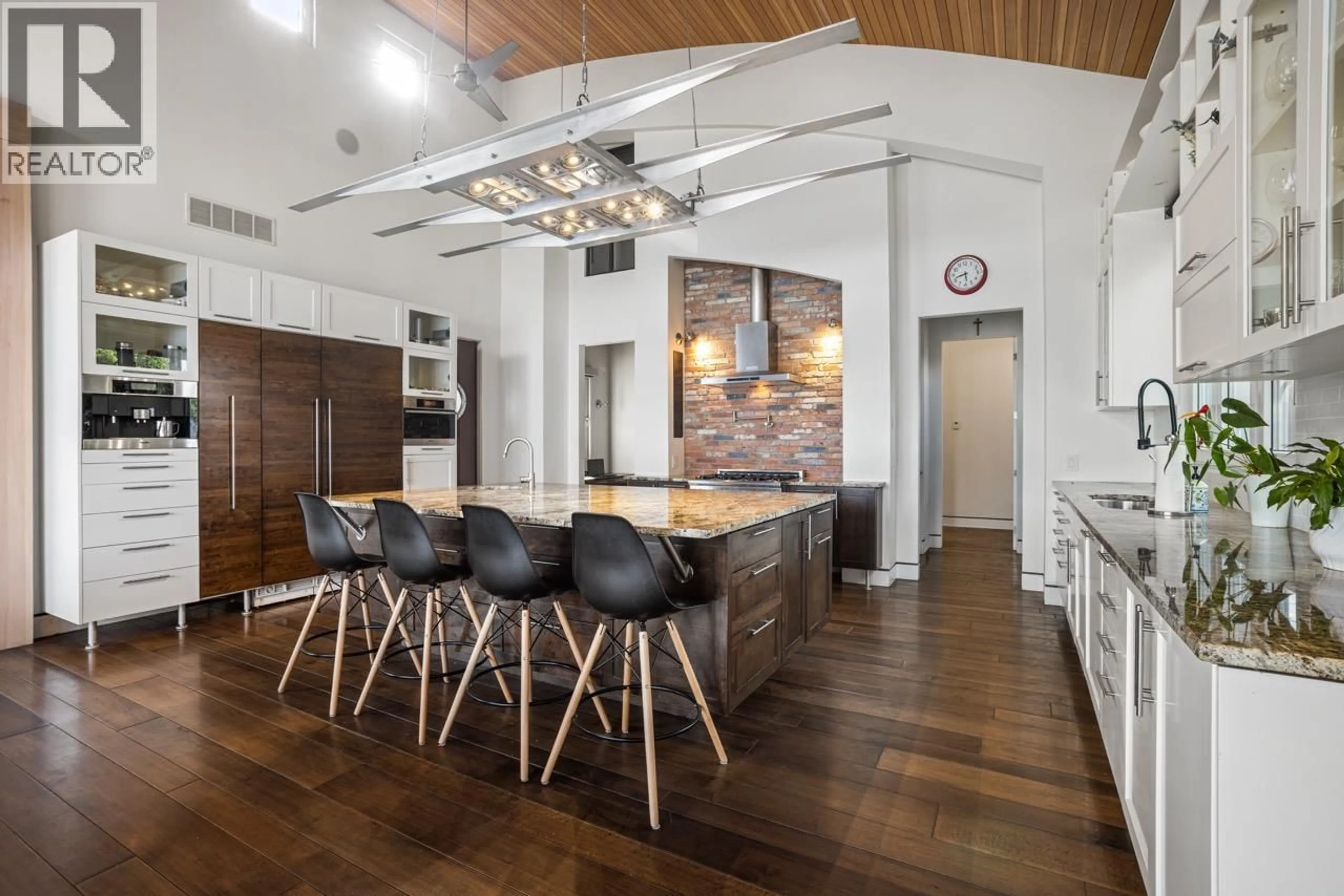 Open concept kitchen, wood/laminate floor for 2737 CASA LOMA ROAD, West Kelowna British Columbia V1Z1T6