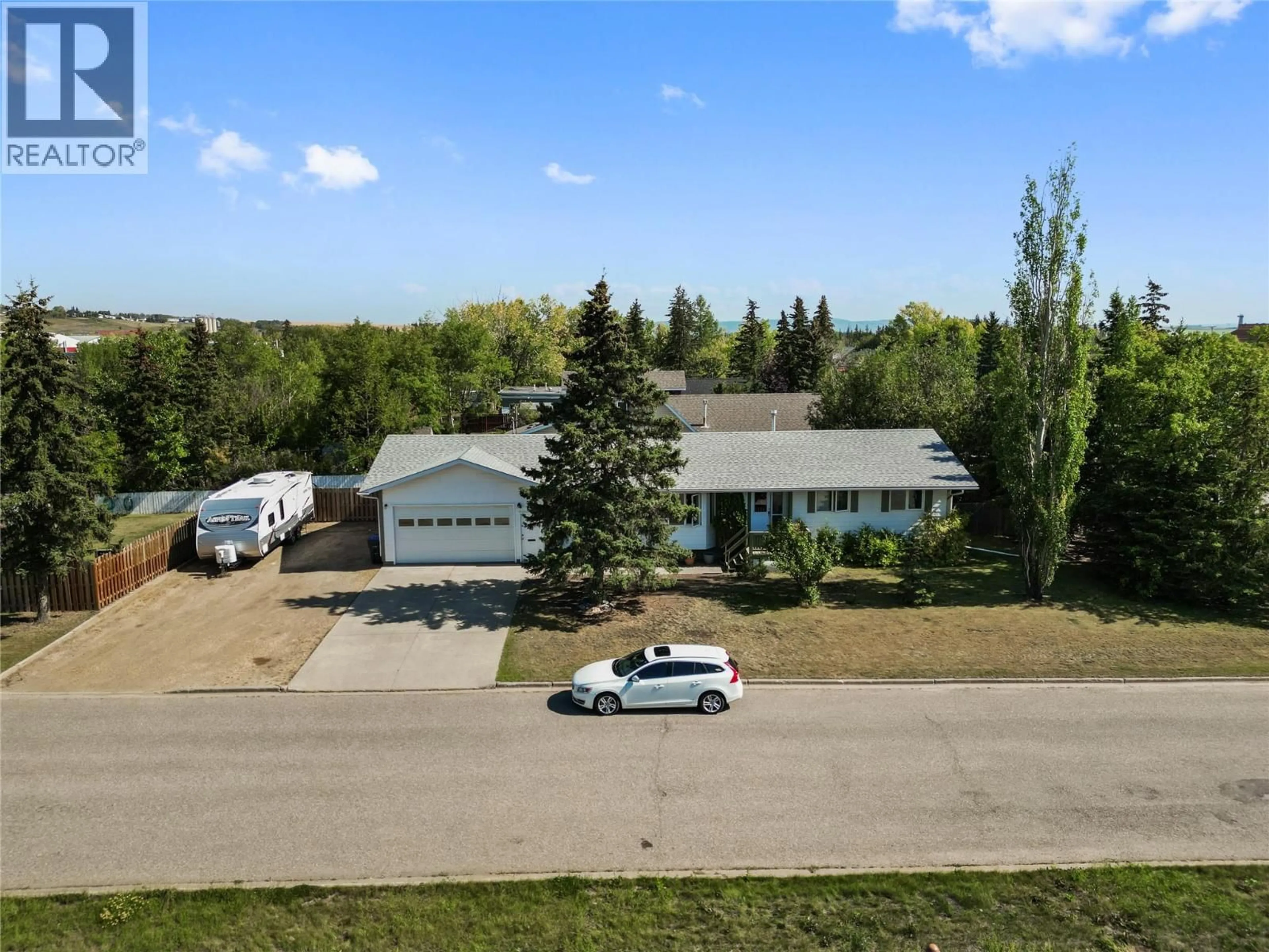 A pic from outside/outdoor area/front of a property/back of a property/a pic from drone, street for 1334 108 AVENUE, Dawson Creek British Columbia V1G2T1