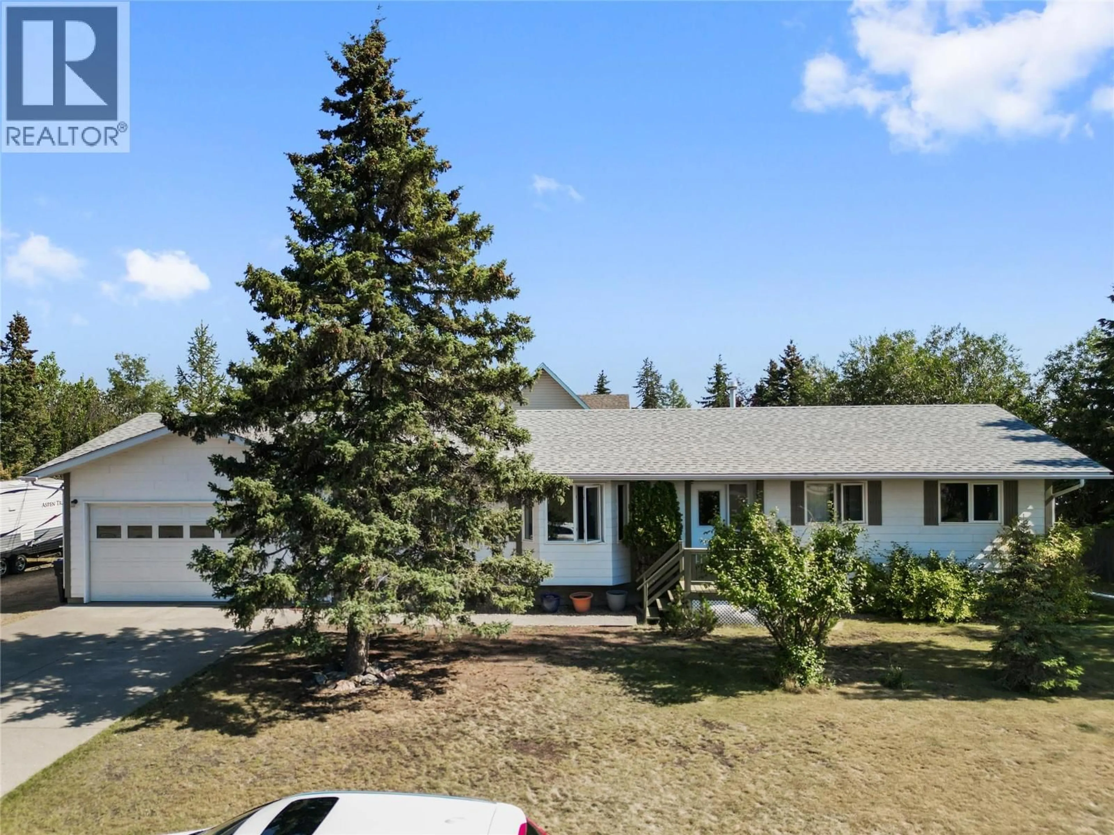 A pic from outside/outdoor area/front of a property/back of a property/a pic from drone, unknown for 1334 108 AVENUE, Dawson Creek British Columbia V1G2T1