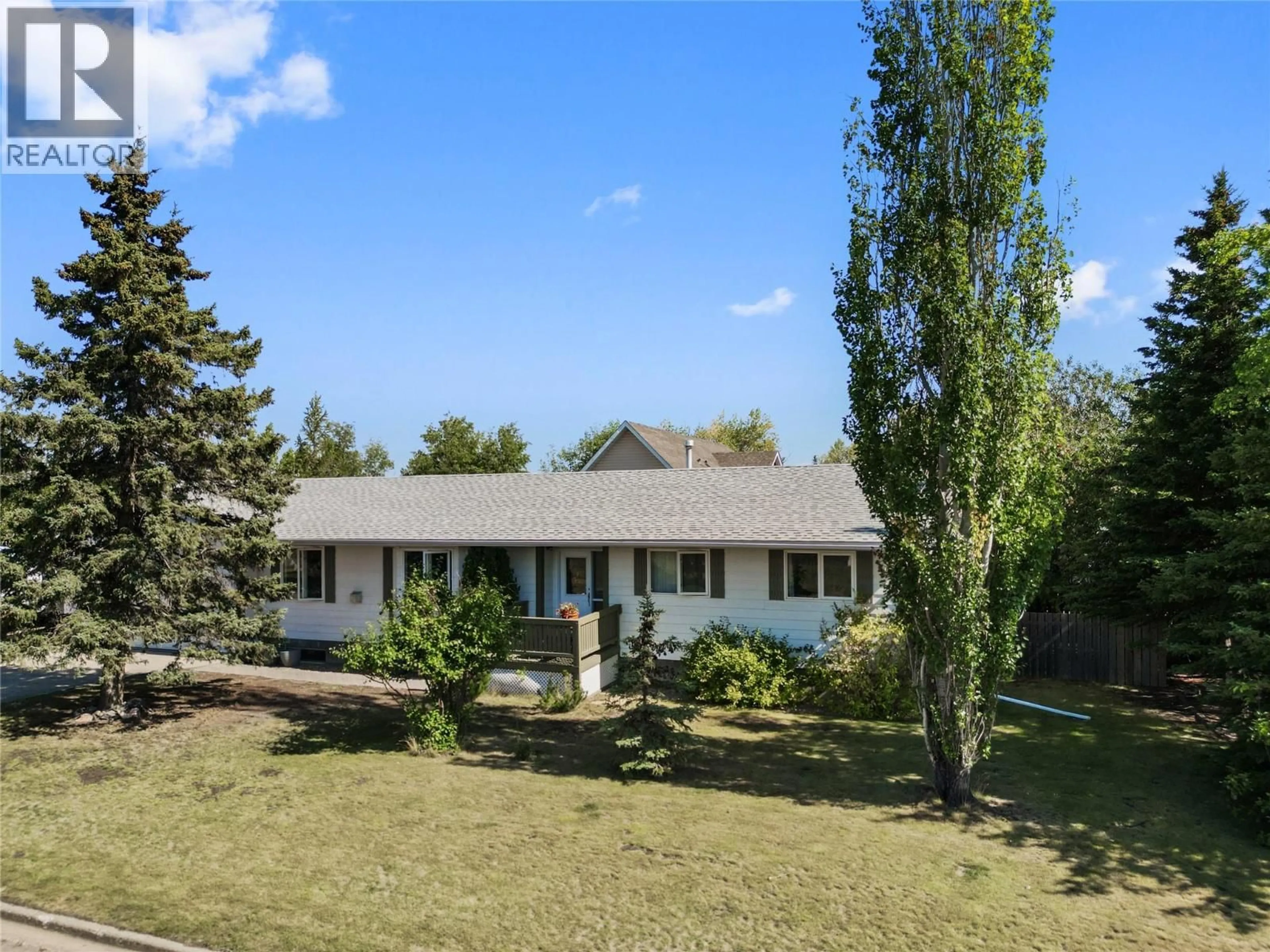 A pic from outside/outdoor area/front of a property/back of a property/a pic from drone, mountain view for 1334 108 AVENUE, Dawson Creek British Columbia V1G2T1