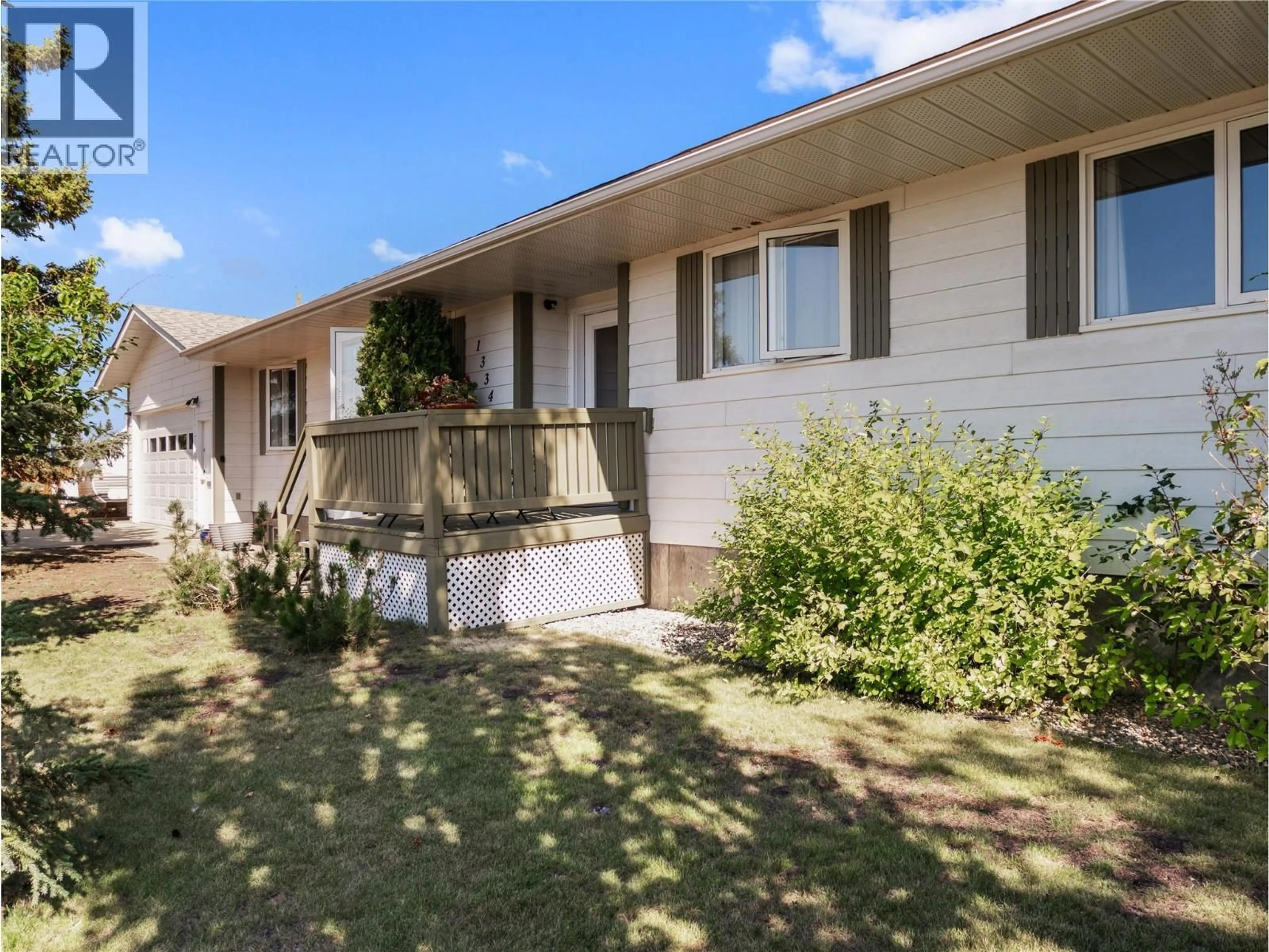 A pic from outside/outdoor area/front of a property/back of a property/a pic from drone, street for 1334 108 AVENUE, Dawson Creek British Columbia V1G2T1