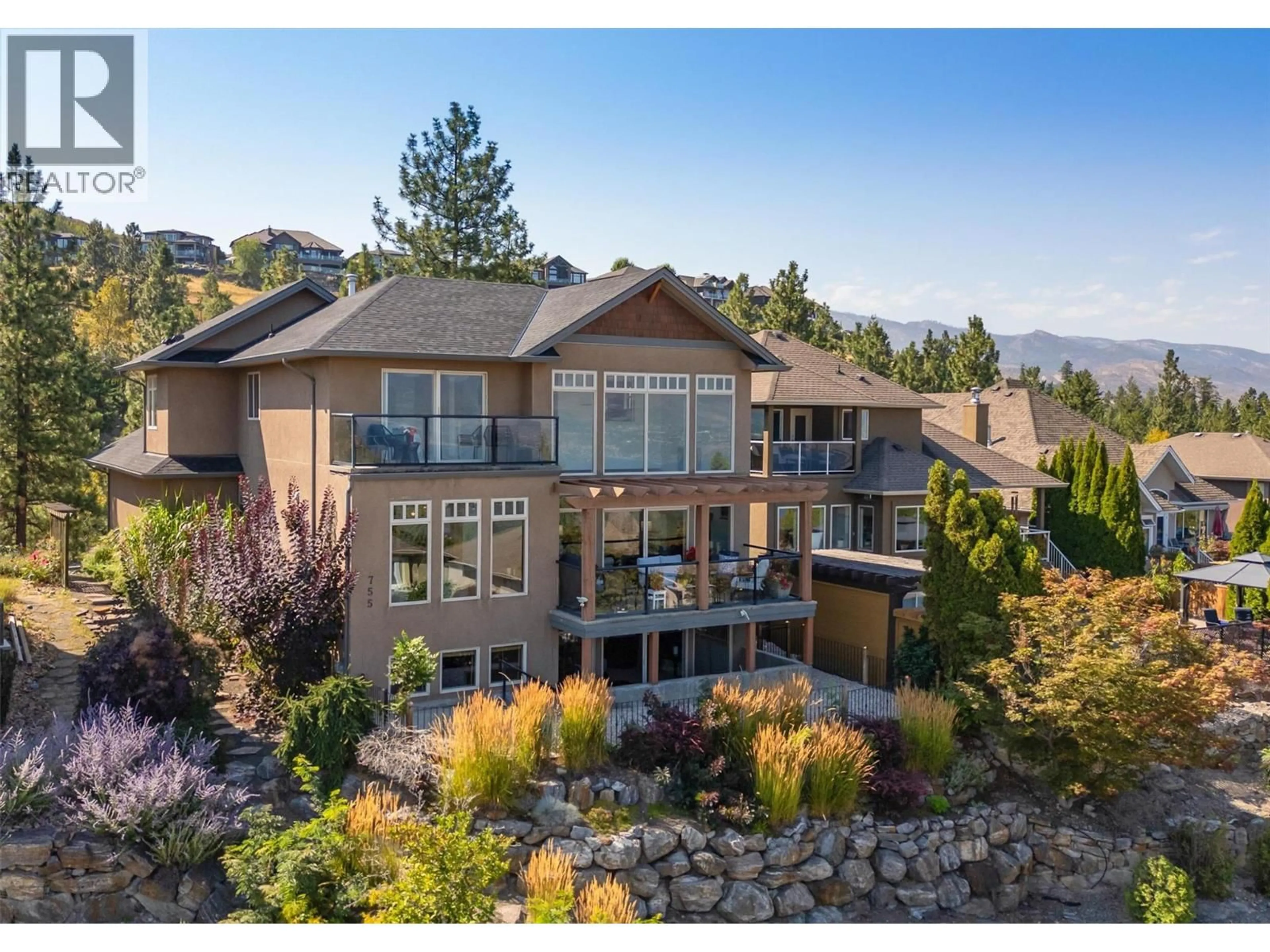 A pic from outside/outdoor area/front of a property/back of a property/a pic from drone, mountain view for 755 SOUTH CREST DRIVE, Kelowna British Columbia V1W4W7