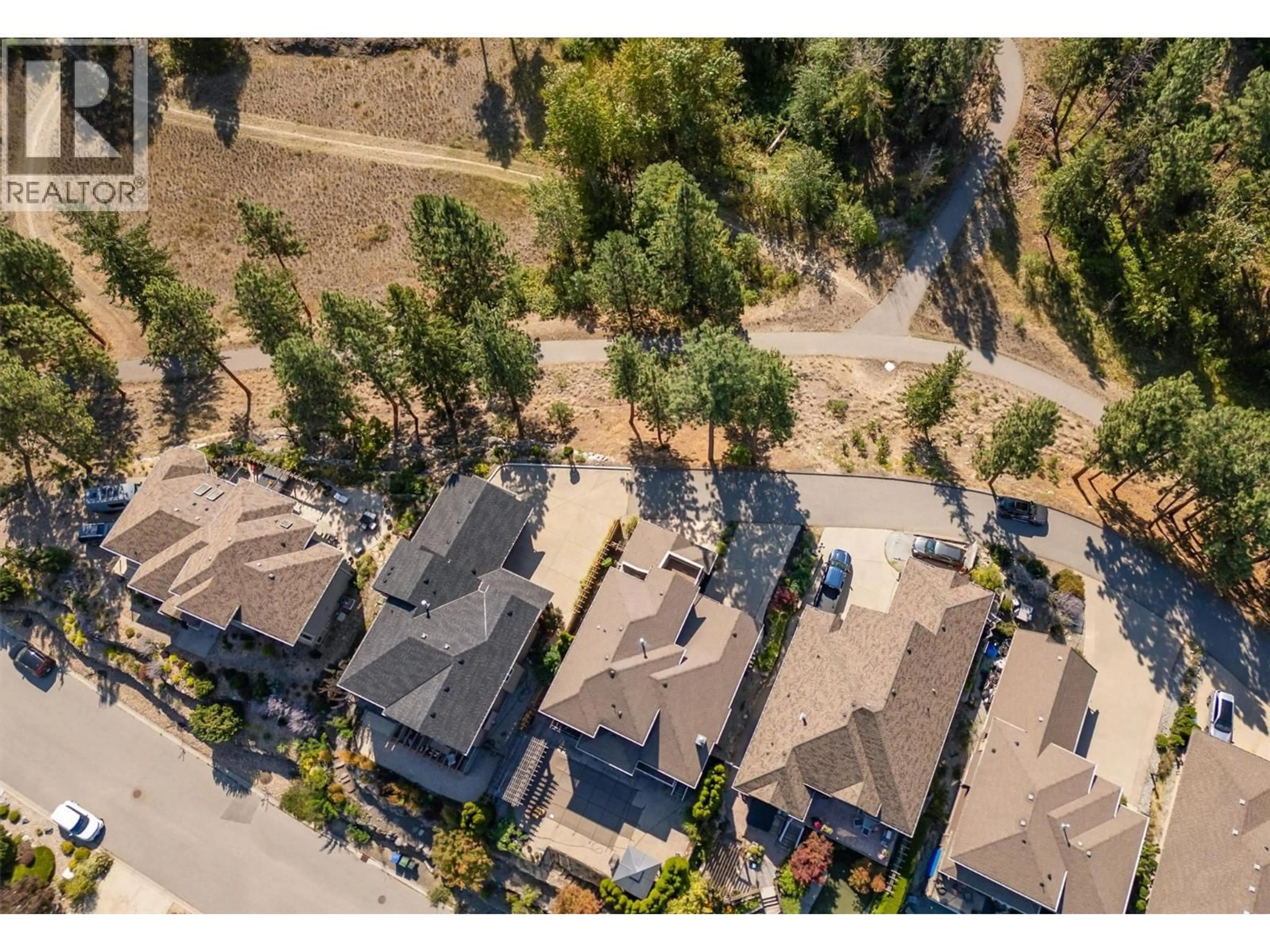 A pic from outside/outdoor area/front of a property/back of a property/a pic from drone, street for 755 SOUTH CREST DRIVE, Kelowna British Columbia V1W4W7
