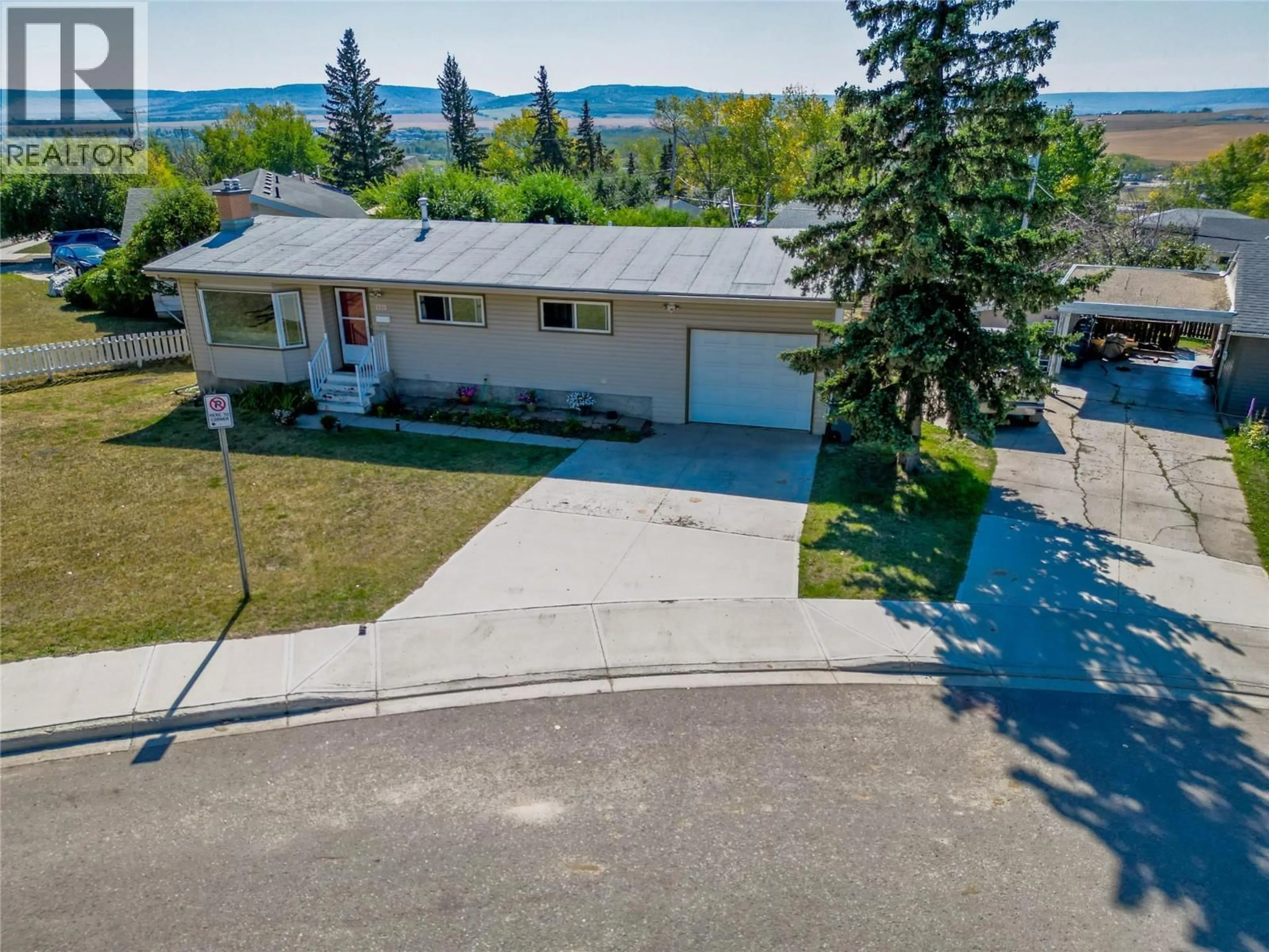 A pic from outside/outdoor area/front of a property/back of a property/a pic from drone, unknown for 1713 92 AVENUE, Dawson Creek British Columbia V1G1C6
